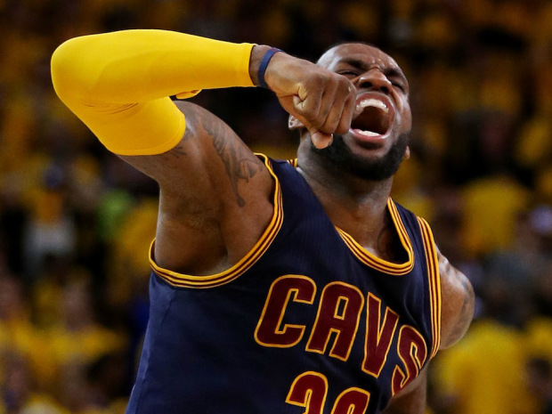 OAKLAND, CA - JUNE 07:  LeBron James #23 of the Cleveland Cavaliers celebrates their 95 to 93 win over the Golden State Warriors in overtime  during Game Two of the 2015 NBA Finals at ORACLE Arena on June 7, 2015 in Oakland, California. NOTE TO USER: User expressly acknowledges and agrees that, by downloading and or using this photograph, user is consenting to the terms and conditions of Getty Images License Agreement.  (Photo by Ezra Shaw/Getty Images)