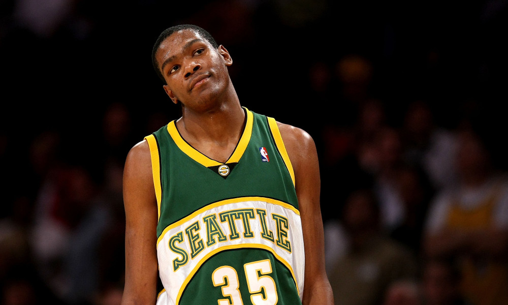 LOS ANGELES, CA - NOVEMBER 27:   Kevin Durant #35 of the Seattle SuperSonics reacts during the game with the Los Angeles Lakers on November 27, 2007 at Staples Center in Los Angeles, California.   The Lakers won 106-99. NOTE TO USER: User expressly acknowledges and agrees that, by downloading and/or using this Photograph, user is consenting to the terms and conditions of the Getty Images License Agreement. (Photo by Stephen Dunn/Getty Images) ORG XMIT: 76076219 GTY ID: 76219SD005_Seattle_Super
