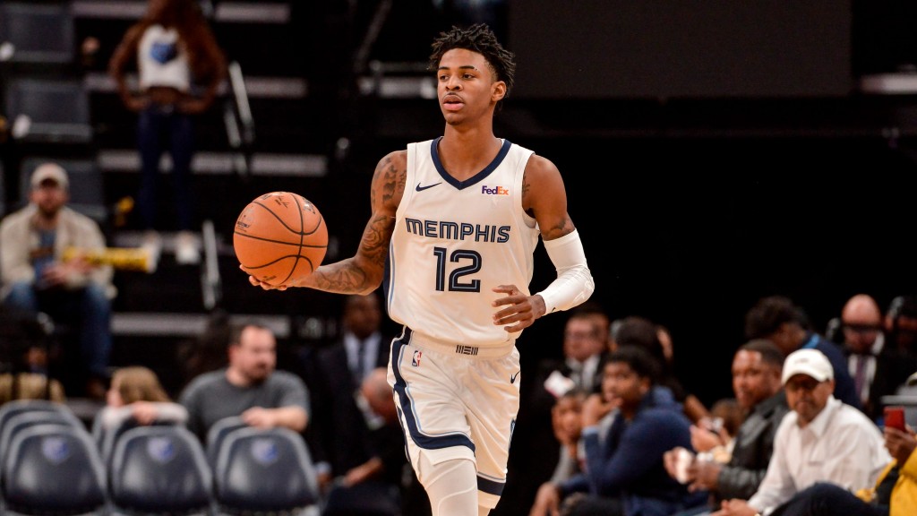 Oct 31, 2024; Memphis, Tennessee, USA; Memphis Grizzlies guard Ja Morant (12) reacts during the first half against the Milwaukee Bucks at FedExForum. Mandatory Credit: Petre Thomas-Imagn Images