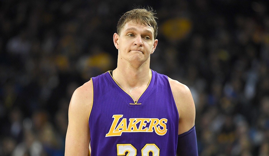OAKLAND, CA - NOVEMBER 23:  Timofey Mozgov #20 of the Los Angeles Lakers reacts as he walks off the court after picking up his third personl foul against the Golden State Warriors in the first quarter of their NBA basketball game at ORACLE Arena on November 23, 2016 in Oakland, California. NOTE TO USER: User expressly acknowledges and agrees that, by downloading and or using this photograph, User is consenting to the terms and conditions of the Getty Images License Agreement.  (Photo by Thearon W. Henderson/Getty Images)