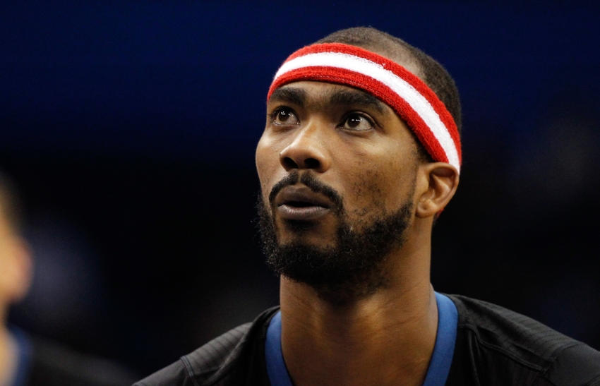 Nov 7, 2014; Orlando, FL, USA; Minnesota Timberwolves guard Corey Brewer (13) shoots a free throw against the Orlando Magic during the second half at Amway Center. Orlando Magic defeated the Minnesota Timberwolves 112-103 in overtime. Mandatory Credit: Kim Klement-USA TODAY Sports