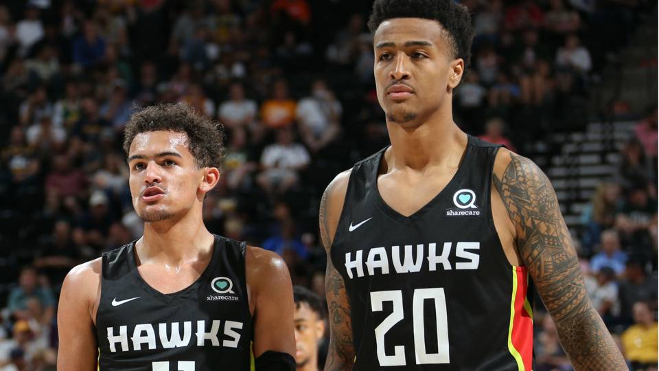 trae-young-john-collins-073118-ftr-gettyjpg_15o3qovdcqjh512nww7z4bwduf