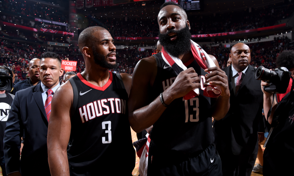 HOUSTON, TX - MAY 8:  Chris Paul #3 and James Harden #13 of the Houston Rockets after the game against the Utah Jazz in Game Five of the Western Conference Semifinals of the 2018 NBA Playoffs on May 8, 2018 at the Toyota Center in Houston, Texas. NOTE TO USER: User expressly acknowledges and agrees that, by downloading and or using this photograph, User is consenting to the terms and conditions of the Getty Images License Agreement. Mandatory Copyright Notice: Copyright 2018 NBAE (Photo by Bill Baptist/NBAE via Getty Images)
