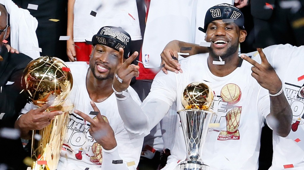  Dwyane Wade, left, and LeBron James celebrate after defeating the San Antonio Spurs 95-88 in Game Seven of the 2013 NBA Finals at AmericanAirlines Arena in Miami.