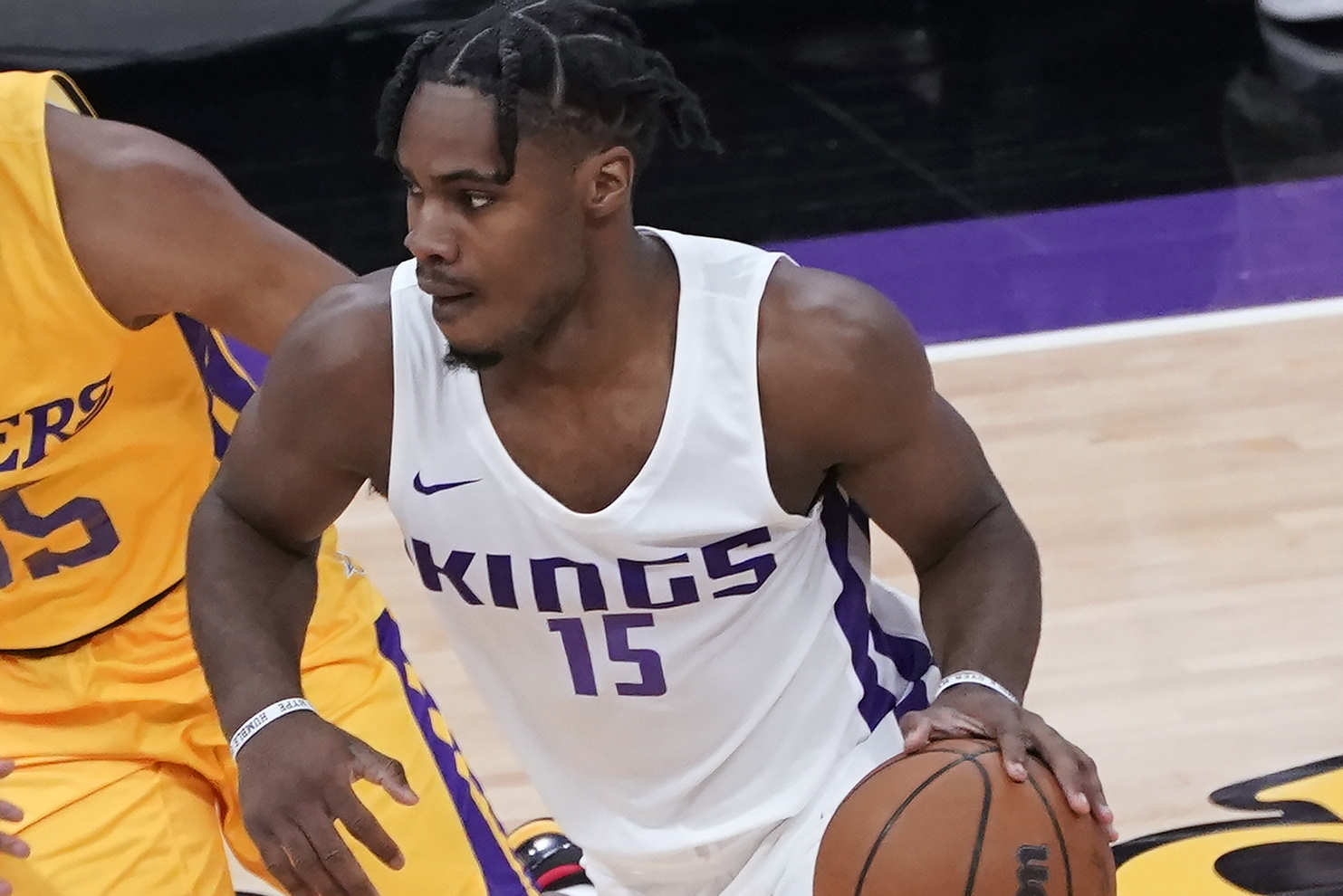 Dec 5, 2024; Toronto, Ontario, CAN; Toronto Raptors guard Davion Mitchell (45) and Oklahoma City Thunder guard Isaiah Joe (11) during the first half at Scotiabank Arena