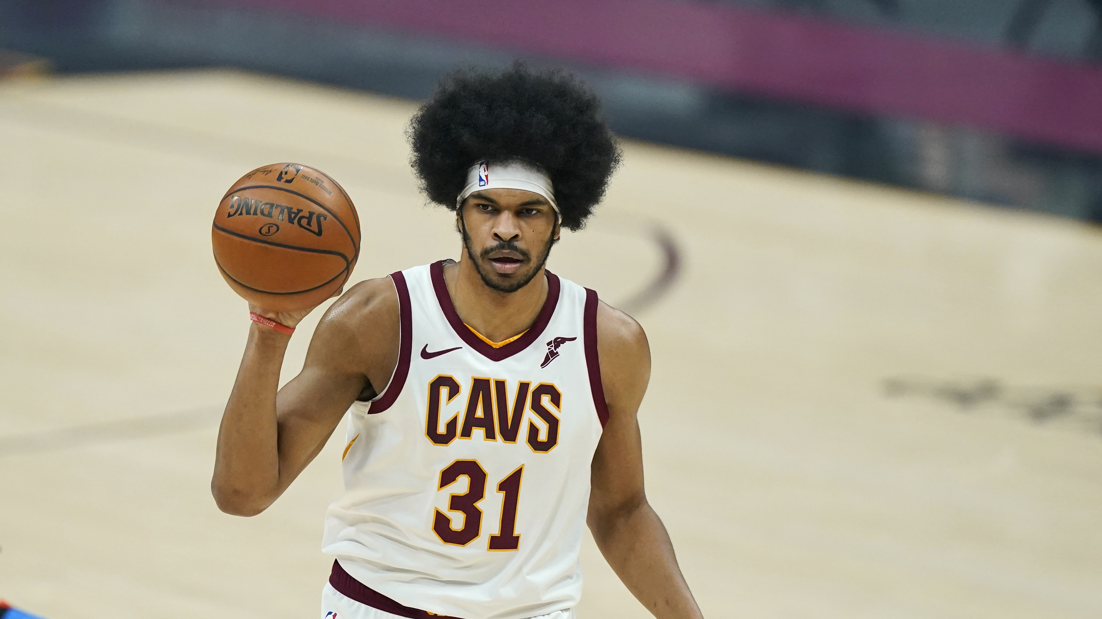 Aug 5, 2020; Lake Buena Vista, Florida, USA; Brooklyn Nets center Jarrett Allen (31) passes around Boston Celtics center Daniel Theis (27) during the first half of an NBA basketball game Wednesday, Aug. 5, 2020 in Lake Buena Vista, Fla. at The Arena.