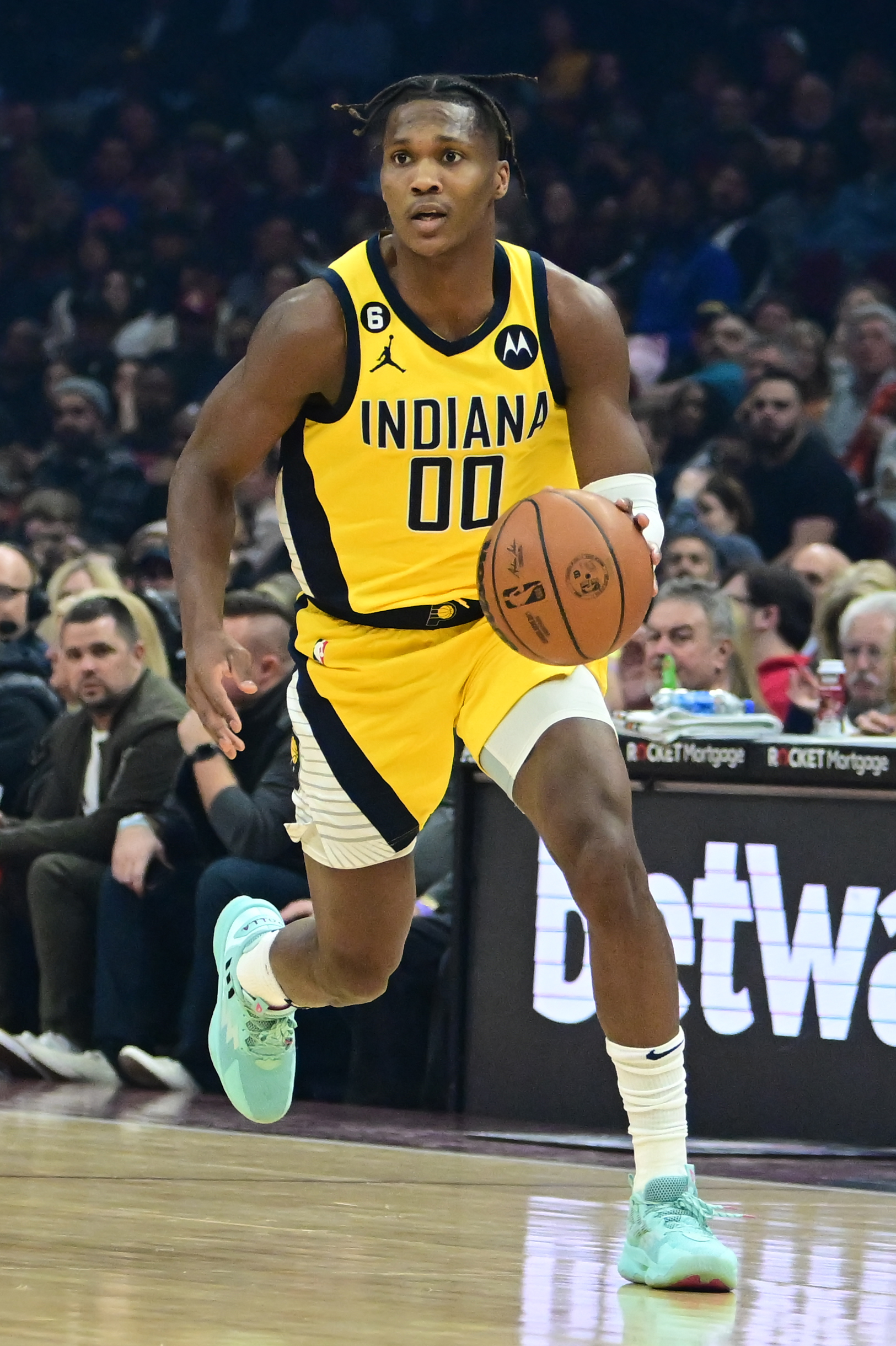 Dec 3, 2024; Toronto, Ontario, CAN; Indiana Pacers guard Bennedict Mathurin (00) reacts to a replay on the scoreboard against the Toronto Raptors during the second half at Scotiabank Arena.