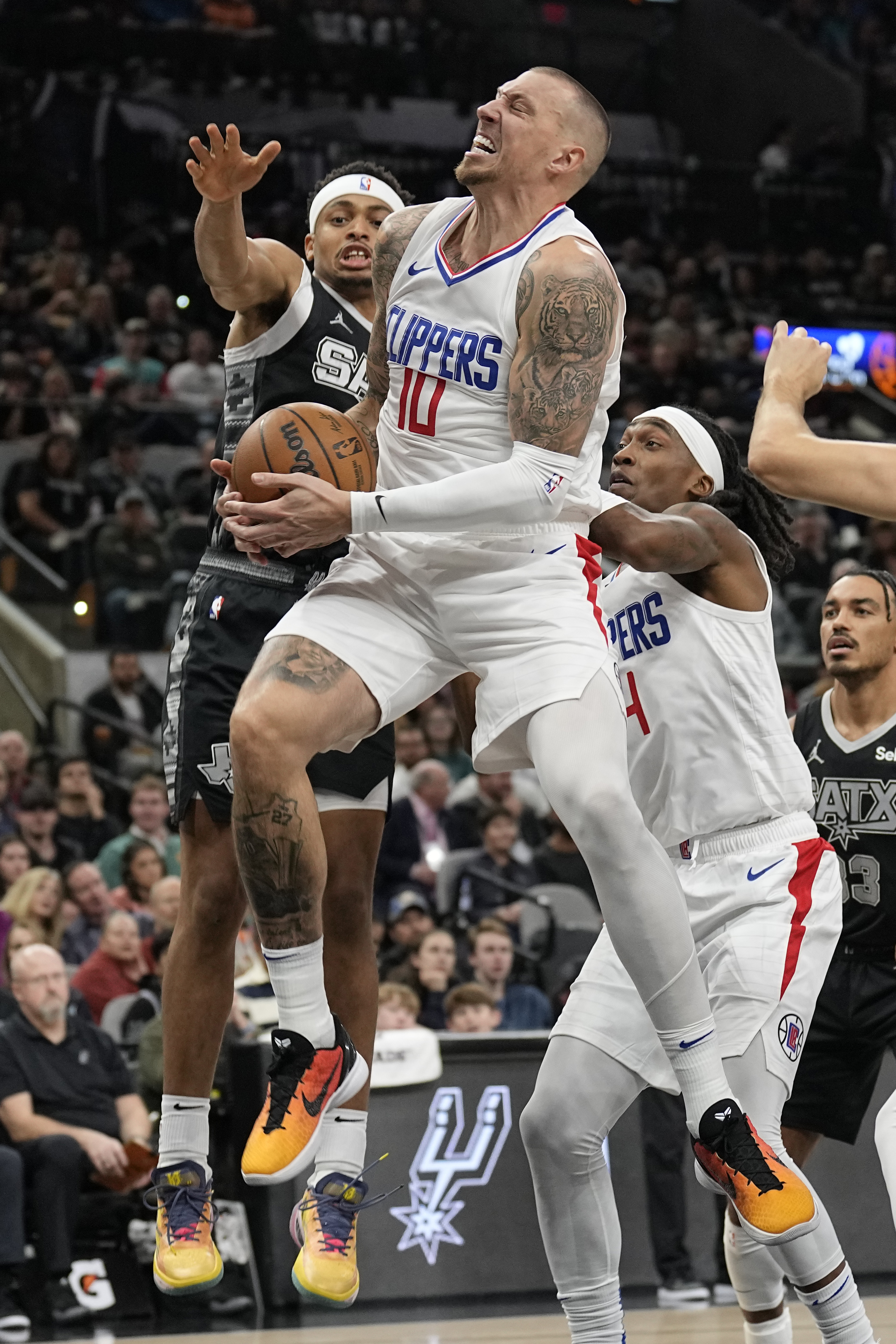<em></noscript></figure>
<p>Daniel Theis, recently acquired by the Clippers to strengthen the frontcourt, adds valuable depth with his contributions on both ends of the floor. Averaging 6.8 points and 4.8 rebounds this season, Theis provides a solid presence in the paint and is known for his tough defense, making him an attractive asset for contenders.</p>
<p>One notable aspect of Theis’s situation is his relatively low salary of $2,179,511 this season and his expiring contract status. This makes him an immediately available piece for inclusion in any trade discussions. Theis’s affordability and expiring contract could make him an appealing component for teams looking to clear cap space or make adjustments to their roster.</p>
<hr>
<h2>Brandon Boston Jr.</h2>
<figure><img width=