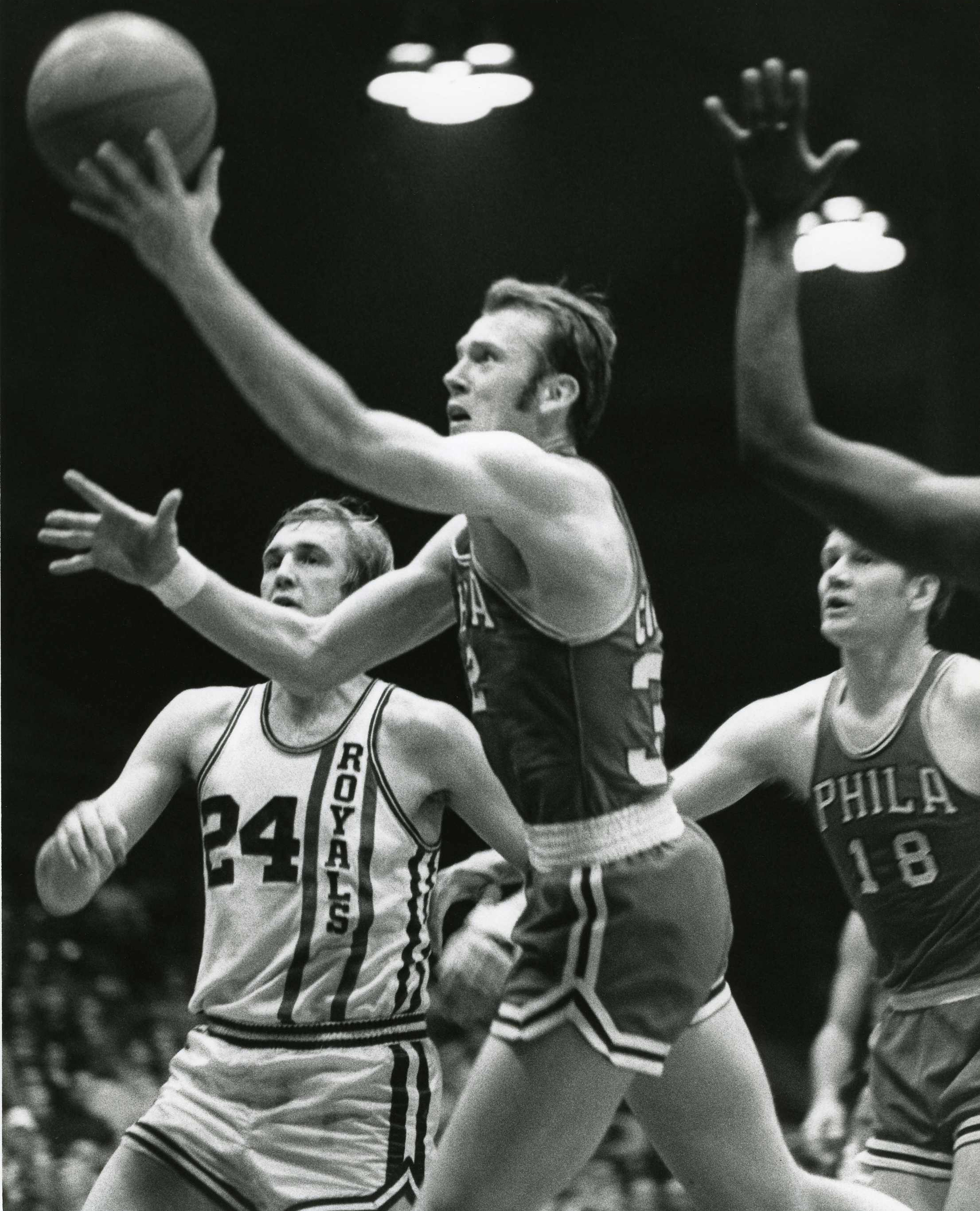 <em></figure>
<p><strong>Years In Philadelphia: 9 (1966-1972, 1975-1976)</strong></p>
<p><strong>Philadelphia: 20.8 PPG, 10.1 RPG, 4.0 APG, 1.2 SPG, 0.5 BPG</strong></p>
<p><strong>Career: 20.8 PPG, 10.1 RPG, 4.0 APG, 1.2 SPG, 0.5 BPG</strong></p>
<p><strong>Honors: NBA Champion (1967), 4x All-Star (1969-1972), 3x All-NBA First Team Selection (1969-1971), All-NBA Second Team Selection (1972), All-Rookie Team Selection (1966)</strong></p>
<p>Billy Cunningham, “The Kangaroo Kid,” as he was affectionately known, left an indelible mark on the franchise during his playing days from 1966 to 1972 especially. Cunningham’s impact was felt on both ends of the court, showcasing a rare combination of scoring finesse, rebounding tenacity, and defensive prowess. A four-time NBA All-Star, Cunningham played a pivotal role in the Sixers’ success during the late 1960s. His ability to score in various ways, from mid-range jumpers to powerful drives to the basket, made him a matchup nightmare for opponents.</p>
<p>The 1966-1967 season stands out as one of Cunningham’s most memorable campaigns, culminating in an NBA championship alongside Wilt Chamberlain. A key contributor to the team’s success, he averaged a double-double with 18.5 points and 7.3 rebounds per game. Cunningham’s leadership and on-court intensity epitomized the spirit of the Sixers during that era. After his playing career, Cunningham transitioned into coaching, guiding the Sixers to an NBA championship in 1983. </p>
<hr>
<h2>9. Dolph Schayes</h2>
<figure><img decoding=