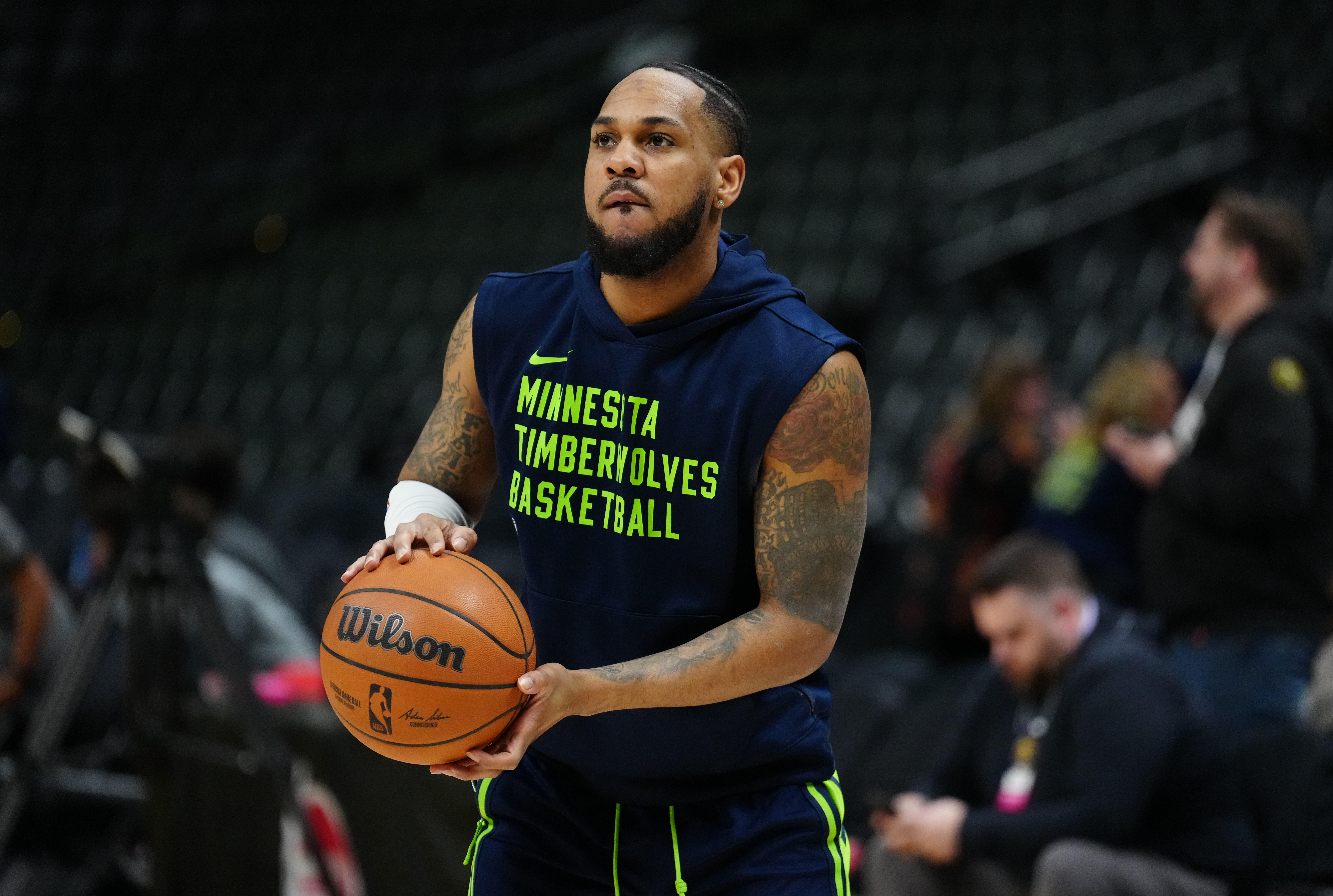 Apr 10, 2024; Denver, Colorado, USA; Minnesota Timberwolves guard Monte Morris (23) before the game against the Denver Nuggets at Ball Arena. Mandatory Credit: Ron Chenoy-Imagn Images