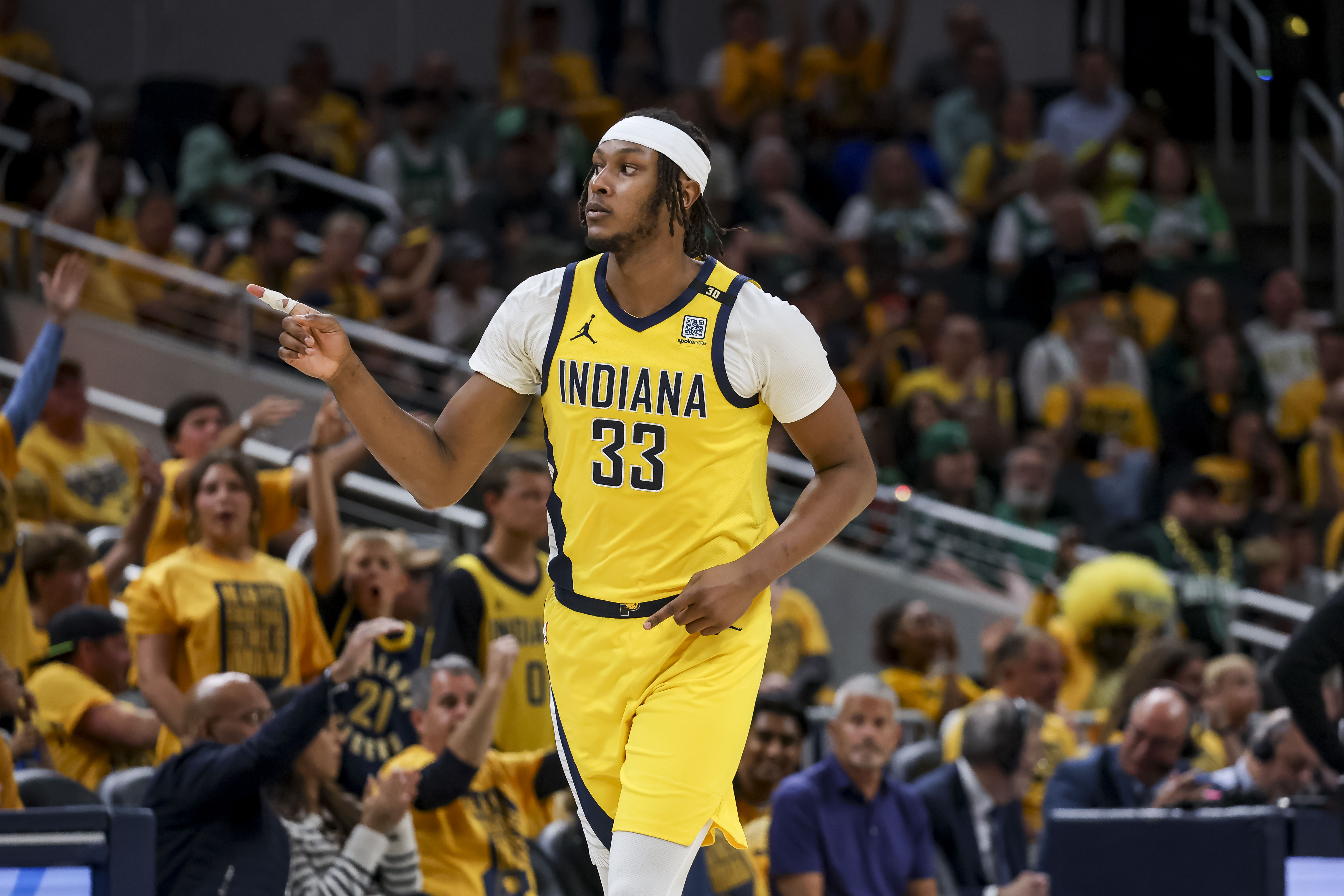 Myles Turner (33) celebrates after a big play at the Gainbridge Fieldhouse.