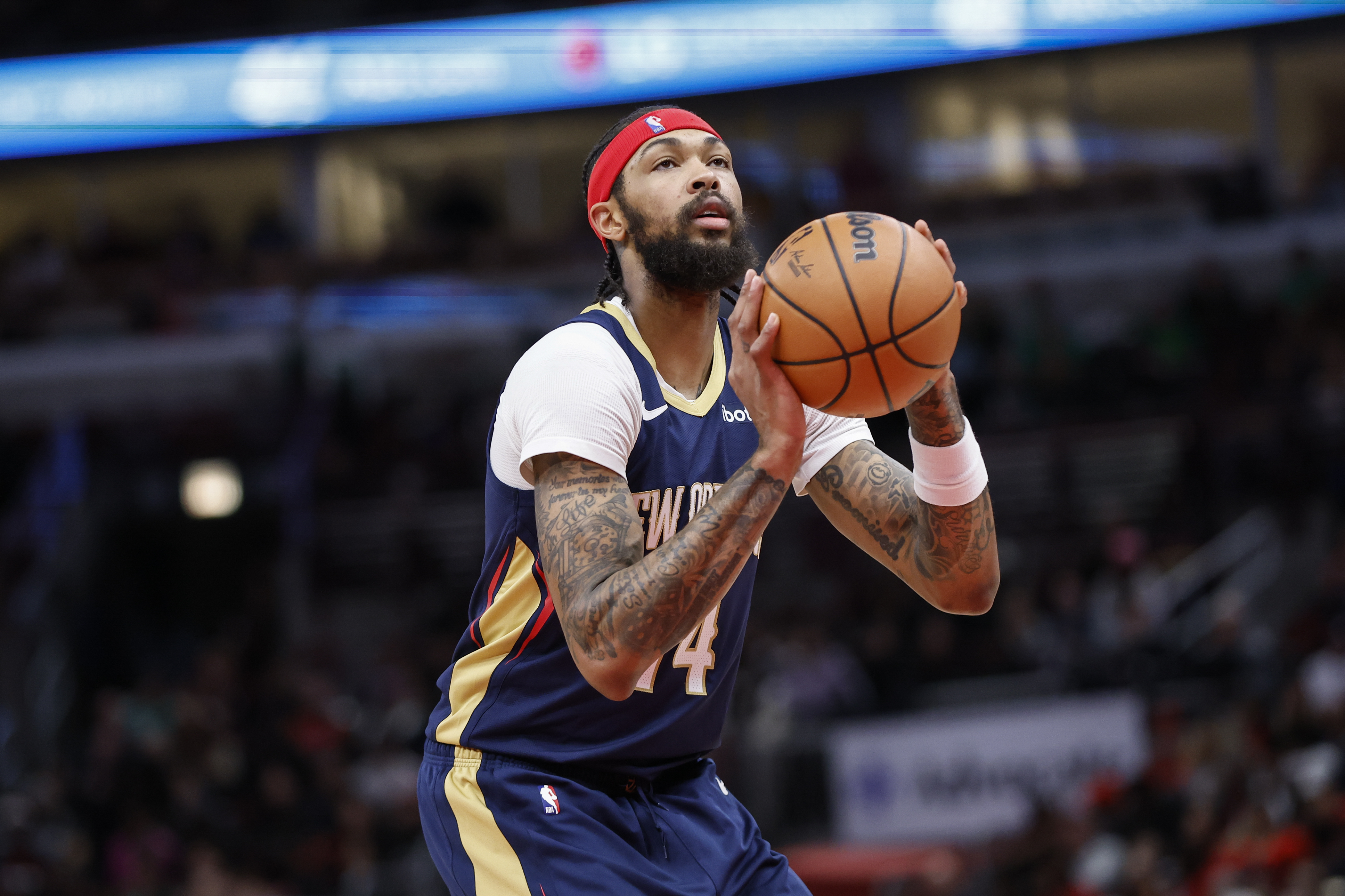 New Orleans Pelicans forward Brandon Ingram (14) shoots free throws at the Smoothie King Center.