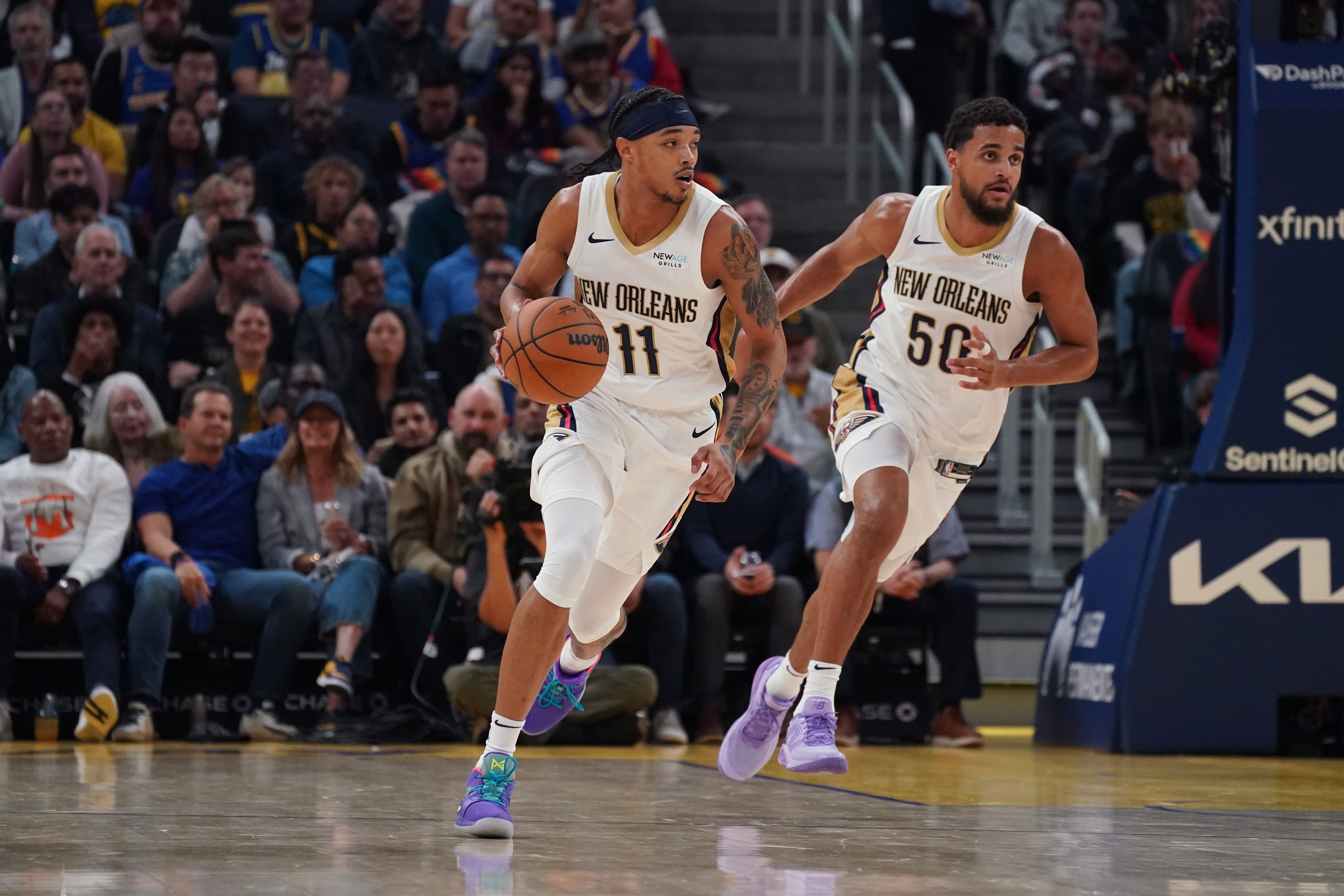 Oct 30, 2024; San Francisco, California, USA; New Orleans Pelicans guard Brandon Boston Jr. (11) and New Orleans Pelicans forward Jeremiah Robinson-Earl (50) sprint upcourt against the Golden State Warriors in the second quarter at Chase Center.