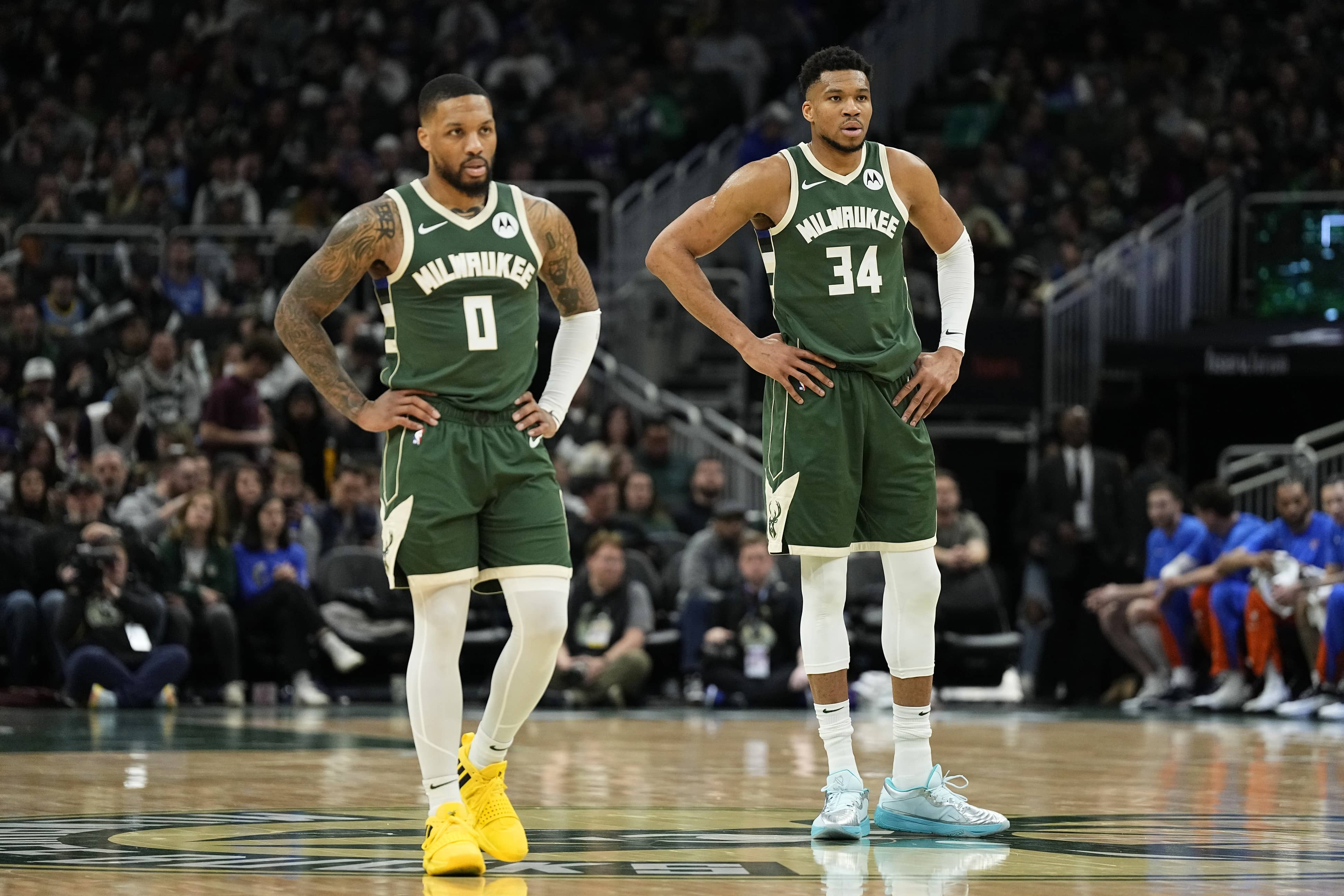 Nov 12, 2024; Milwaukee, Wisconsin, USA; Milwaukee Bucks forward Giannis Antetokounmpo (34) sits with guard Damian Lillard on the bench during the fourth quarter against the Toronto Raptors at Fiserv Forum.
