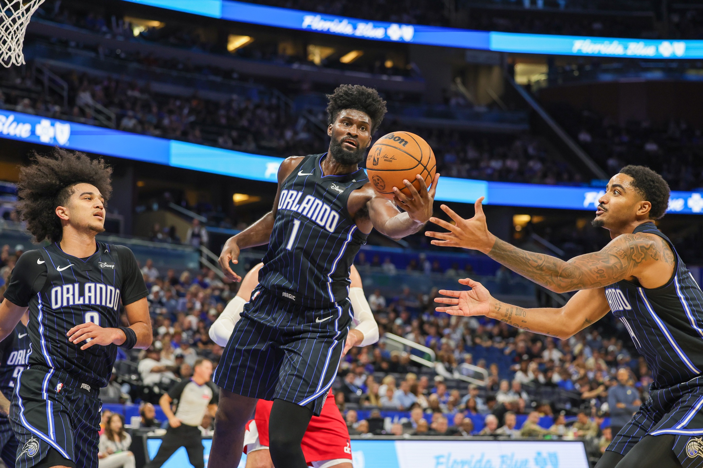 Nov 10, 2024; Orlando, Florida, USA; Orlando Magic forward Jonathan Isaac (1) grabs the rebound during the second quarter against the Washington Wizards at Kia Center.
