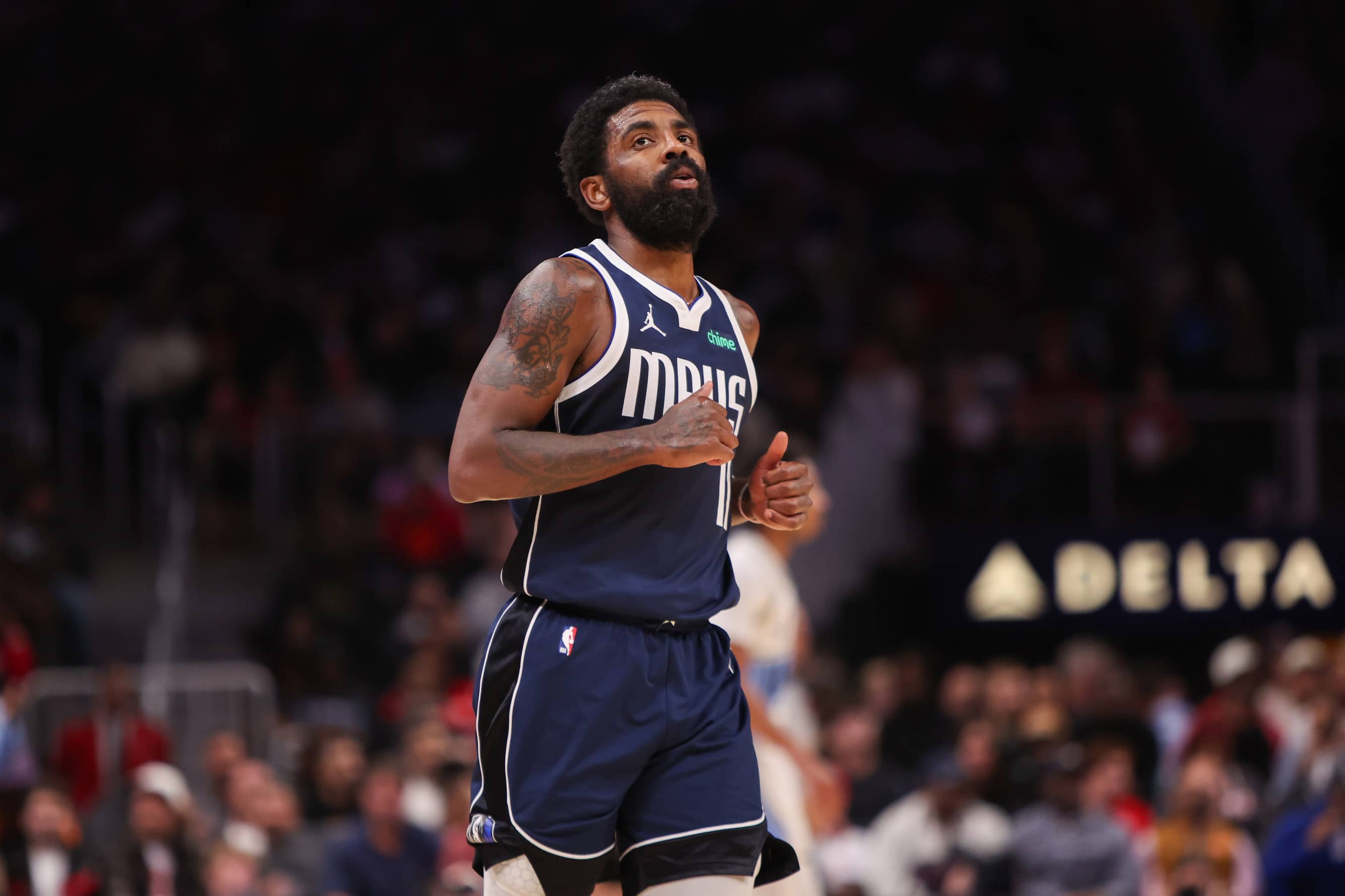Dallas Mavericks guard Kyrie Irving (11) in action against the Atlanta Hawks in the fourth quarter at State Farm Arena. Mandatory Credit: Brett Davis-Imagn Images