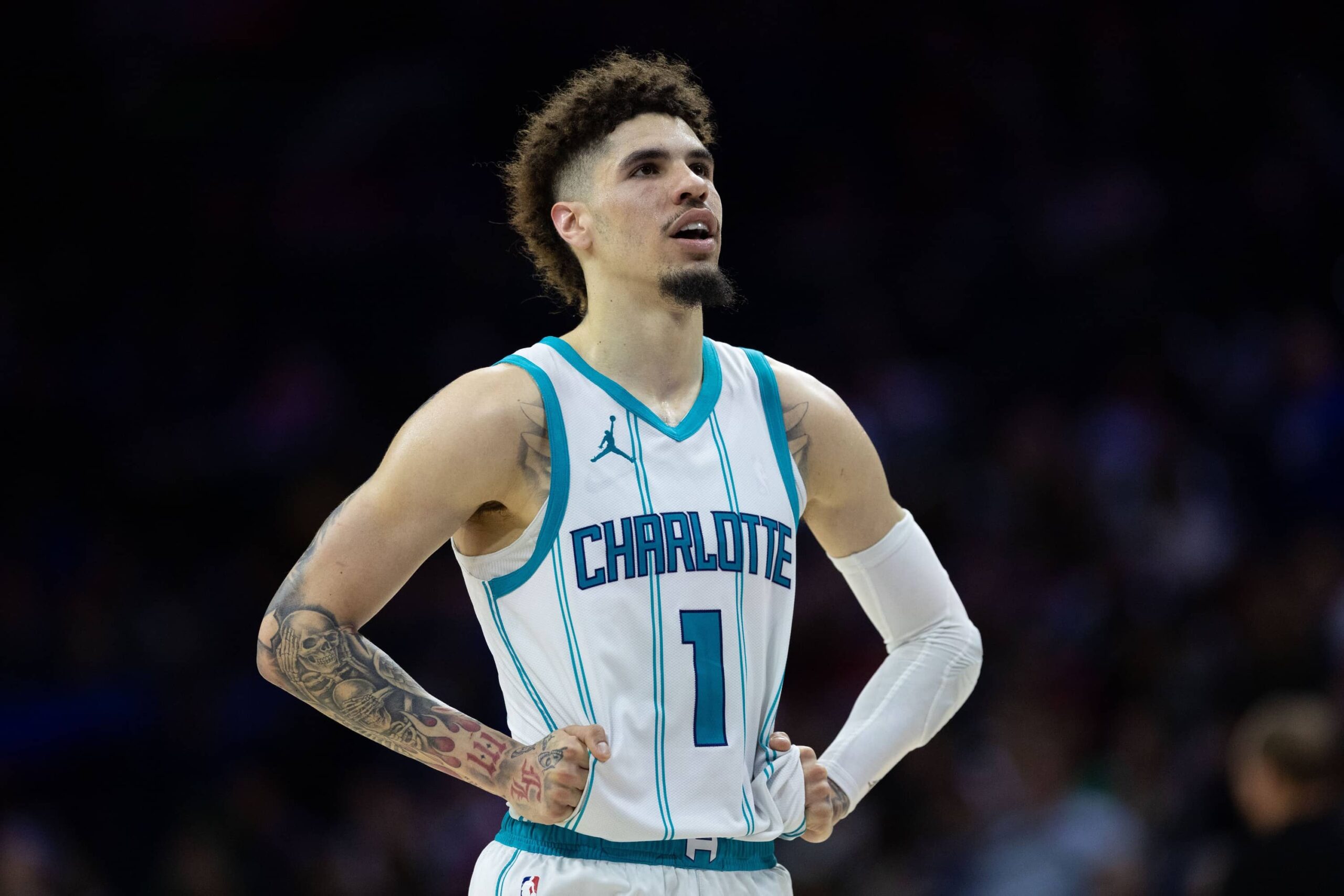 LaMelo Ball looks on during a Hornets game.