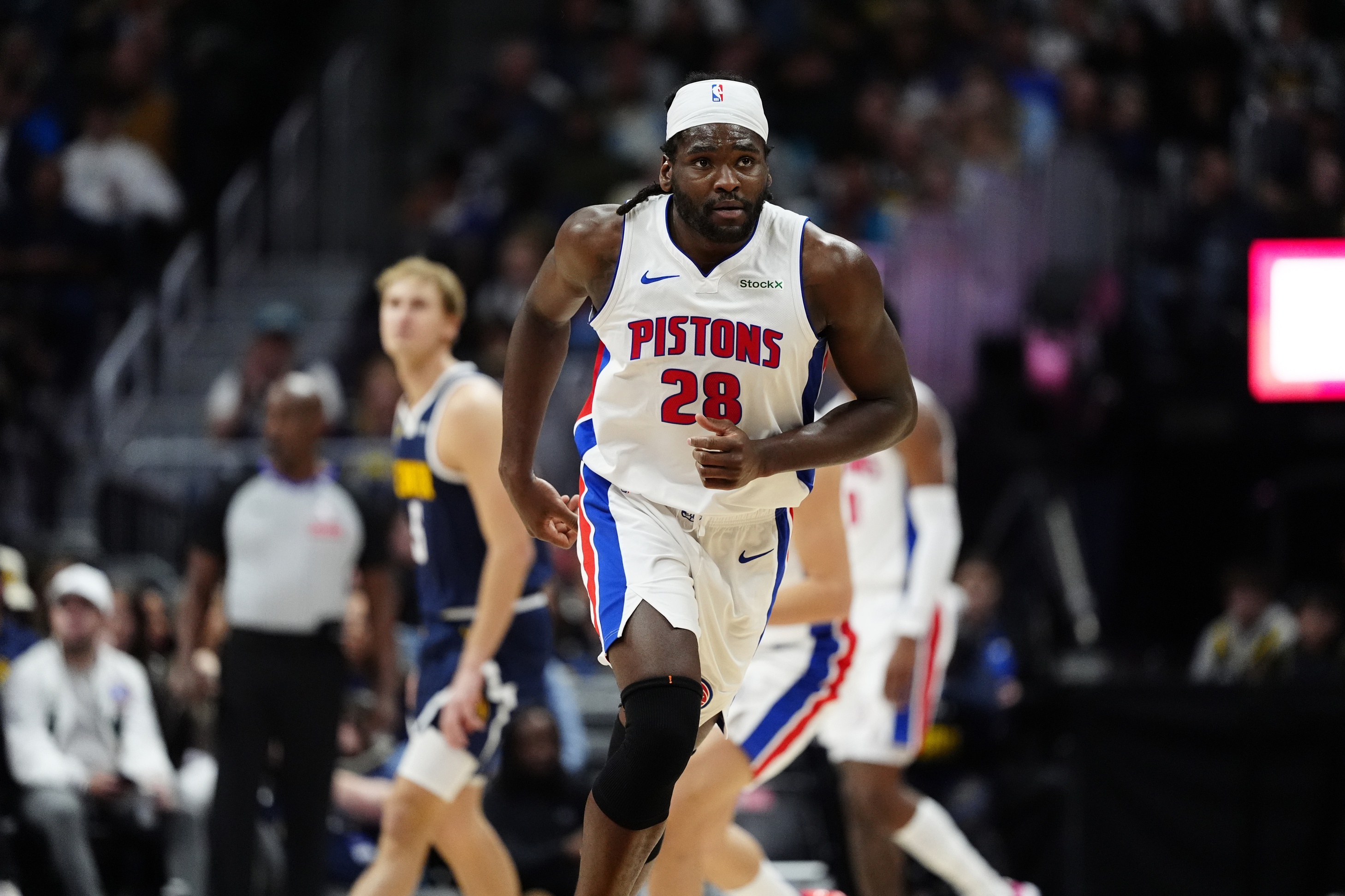 Dec 28, 2024; Denver, Colorado, USA; Detroit Pistons center Isaiah Stewart (28) looks on following his three point basket in the second quarter against the Denver Nuggets at Ball Arena. Mandatory Credit: Ron Chenoy-Imagn Images