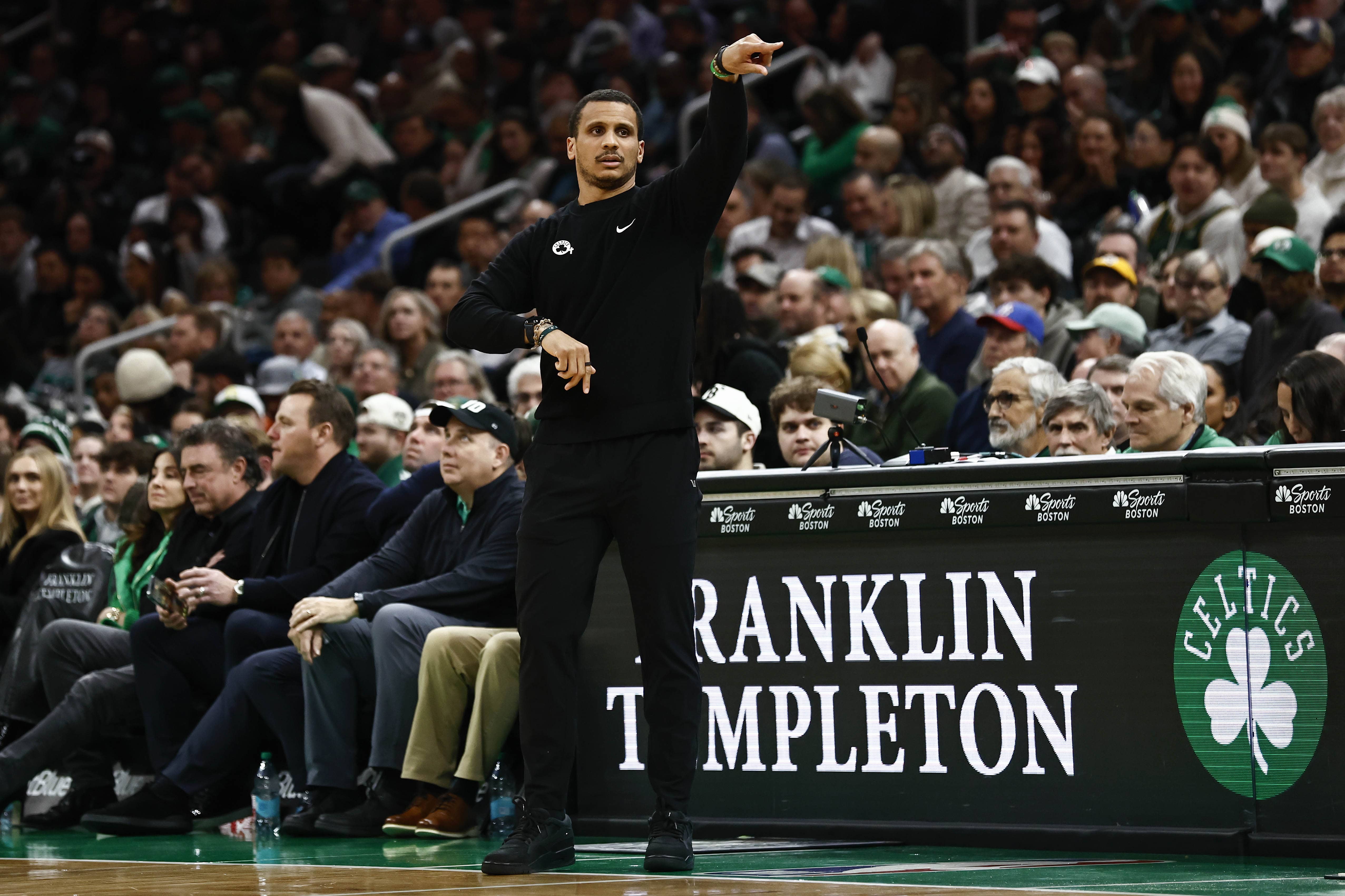 Boston Celtics head coach Joe Mazzulla looks on from the bench against the Washington Wizards in the second quarter at Capital One Arena. Mandatory Credit: Geoff Burke-Imagn Images