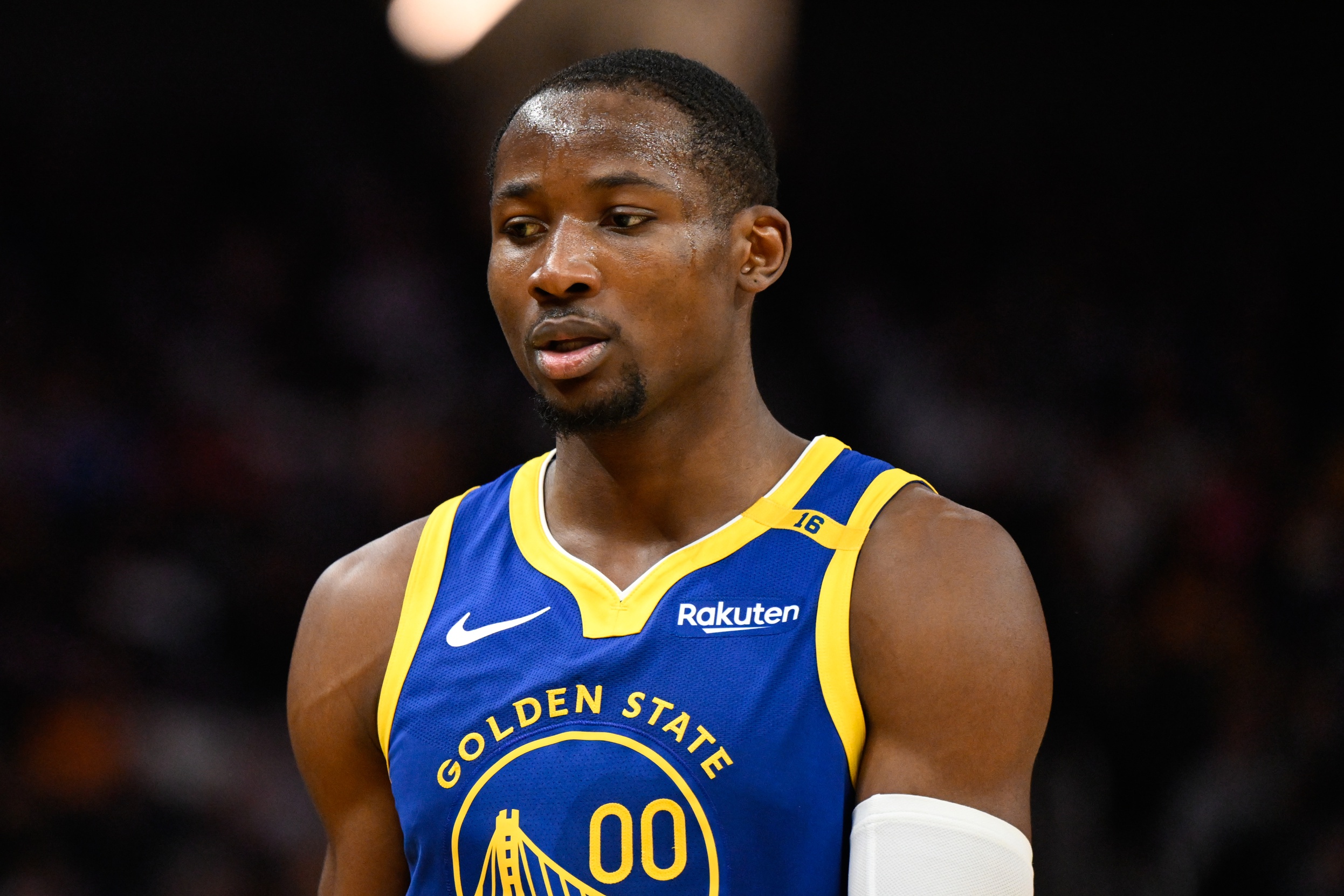 Jan 4, 2025; San Francisco, California, USA; Golden State Warriors forward Jonathan Kuminga (00) dribbles up court in front of Memphis Grizzlies guard Scotty Pippen Jr. (1) in the second quarter at Chase Center. Mandatory Credit: David Gonzales-Imagn Images  