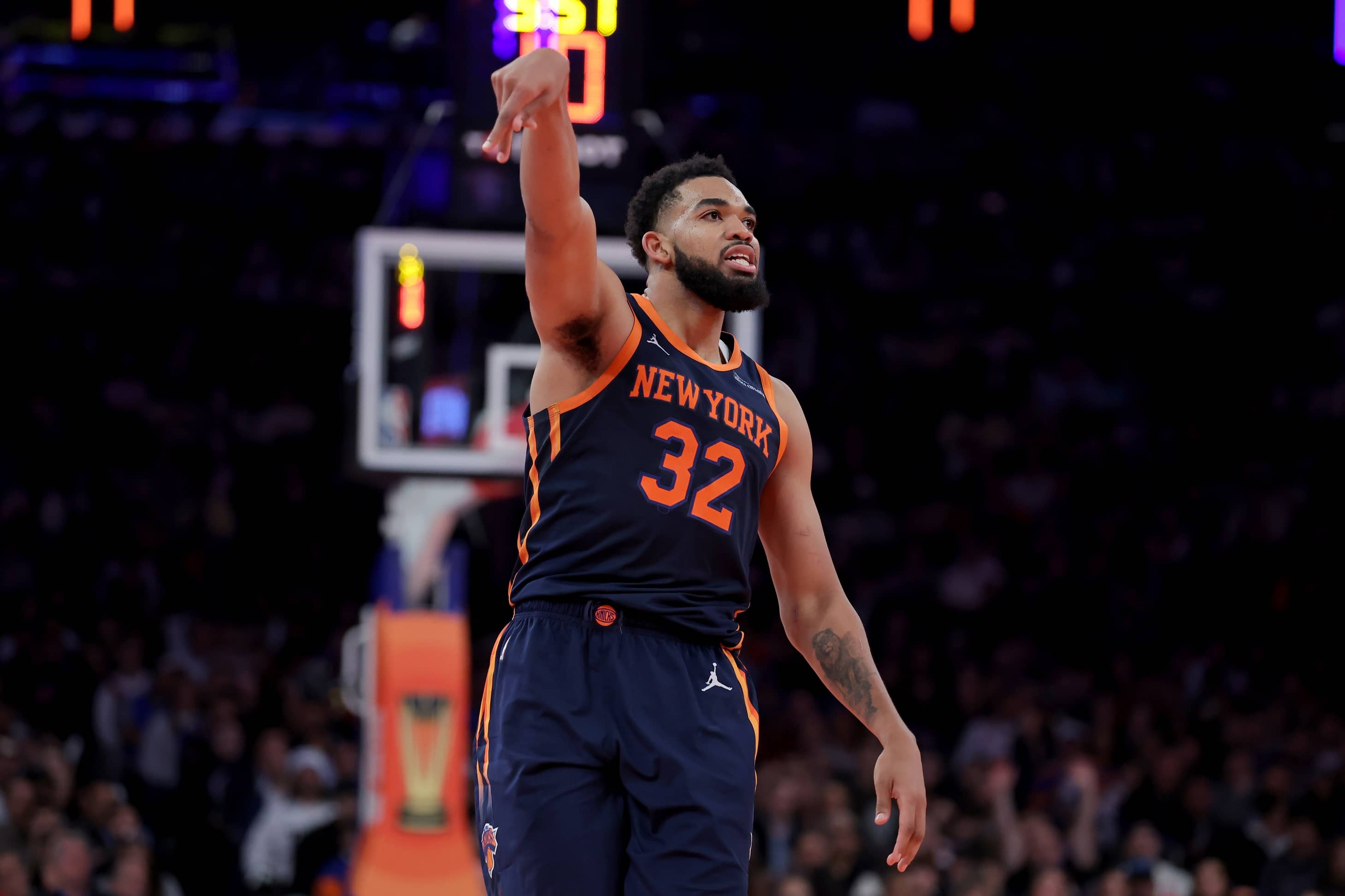 New York Knicks center Karl-Anthony Towns (32) watches his three point shot against the Atlanta Hawks during the third quarter at Madison Square Garden.