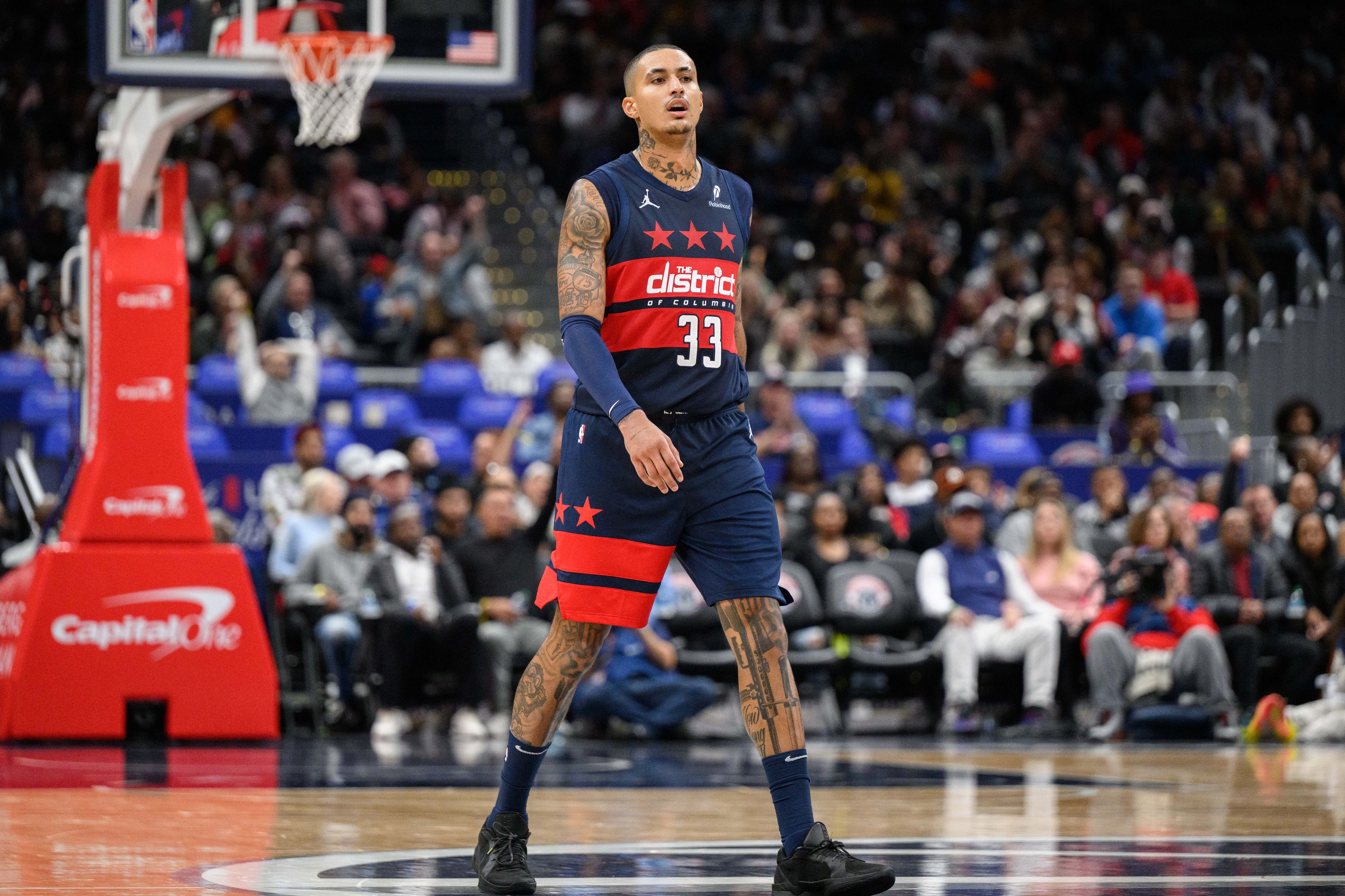 Washington Wizards forward Kyle Kuzma (33) walks up to the court during the second quarter against the Cleveland Cavaliers at Capital One Arena. Mandatory Credit: Reggie Hildred-Imagn Images