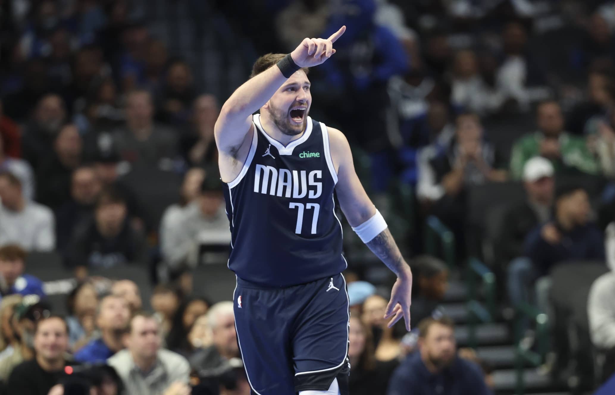 Dec 3, 2024; Dallas, Texas, USA; Dallas Mavericks guard Luka Doncic (77) reacts during the first quarter against the Memphis Grizzlies at American Airlines Center. Mandatory Credit: Kevin Jairaj-Imagn Images  