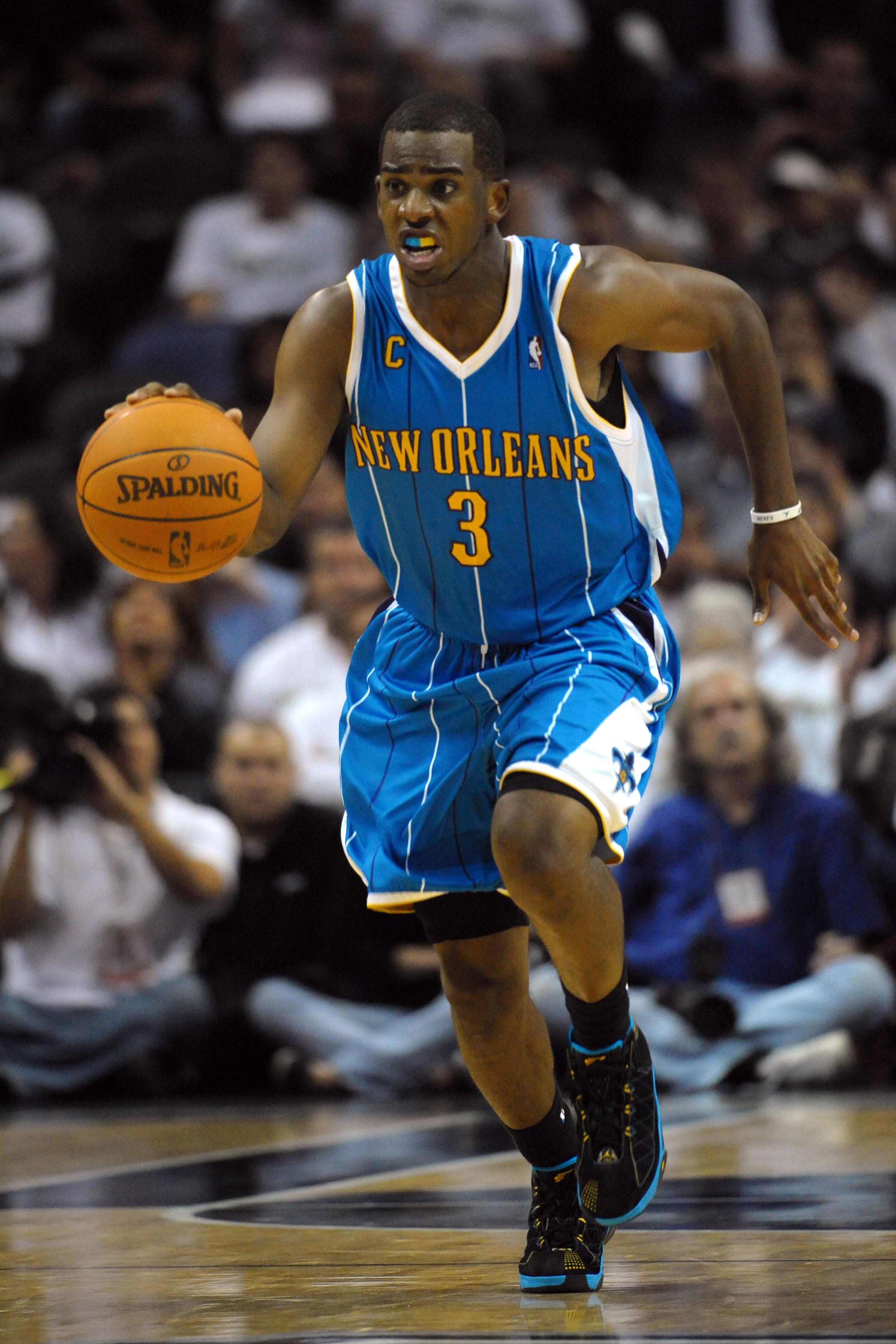 Oct 28, 2009; San Antonio, TX, USA; New Orleans Hornets guard Chris Paul (3) controls the ball against the San Antonio Spurs during the second half at the AT&T Center. San Antonio beat New Orleans 113-96. Mandatory Credit: Brendan Maloney-Imagn Images  