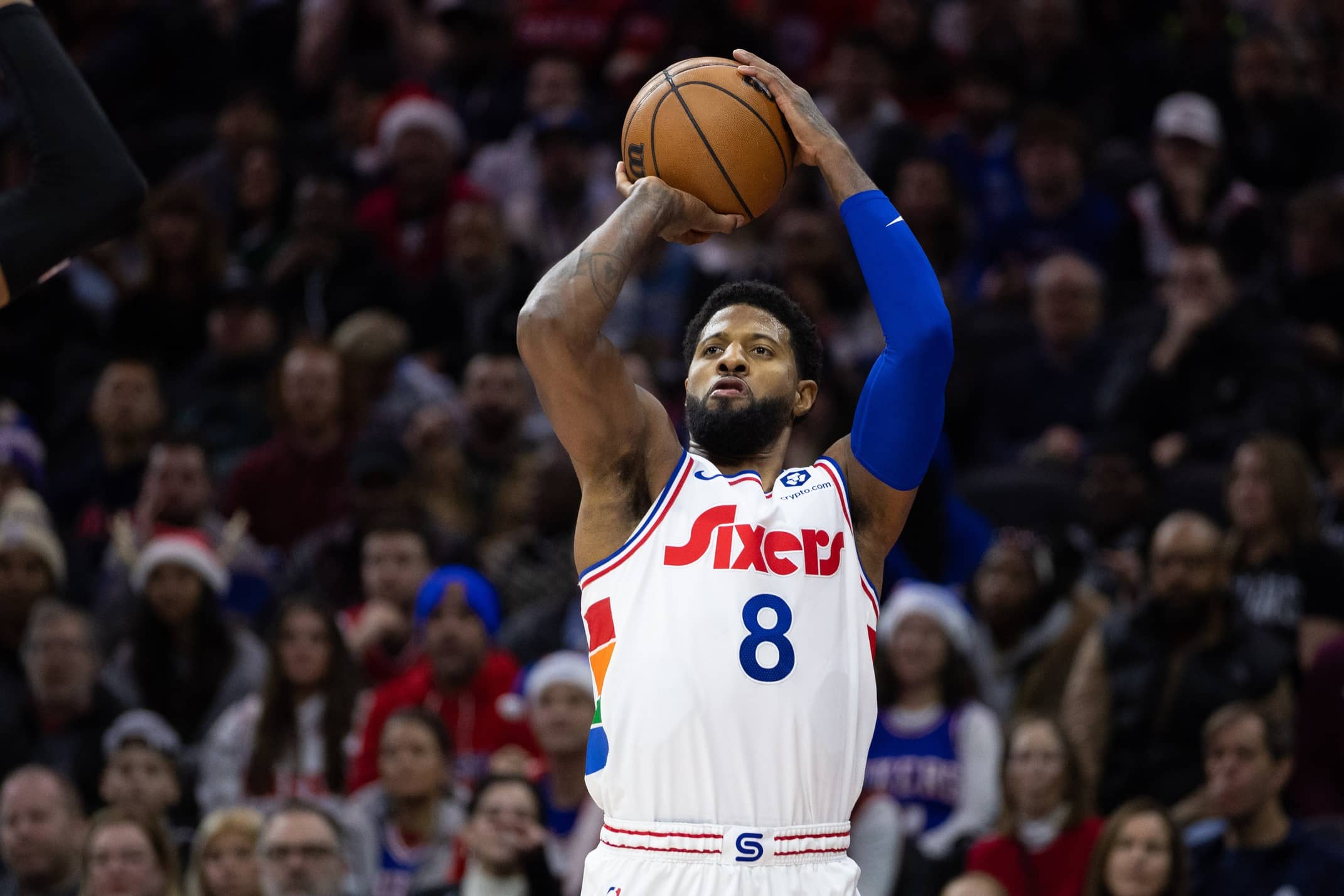 Dec 23, 2024; Philadelphia, Pennsylvania, USA; Philadelphia 76ers forward Paul George (8) shoots the ball against the San Antonio Spurs during the second quarter at Wells Fargo Center. Mandatory Credit: Bill Streicher-Imagn Images
