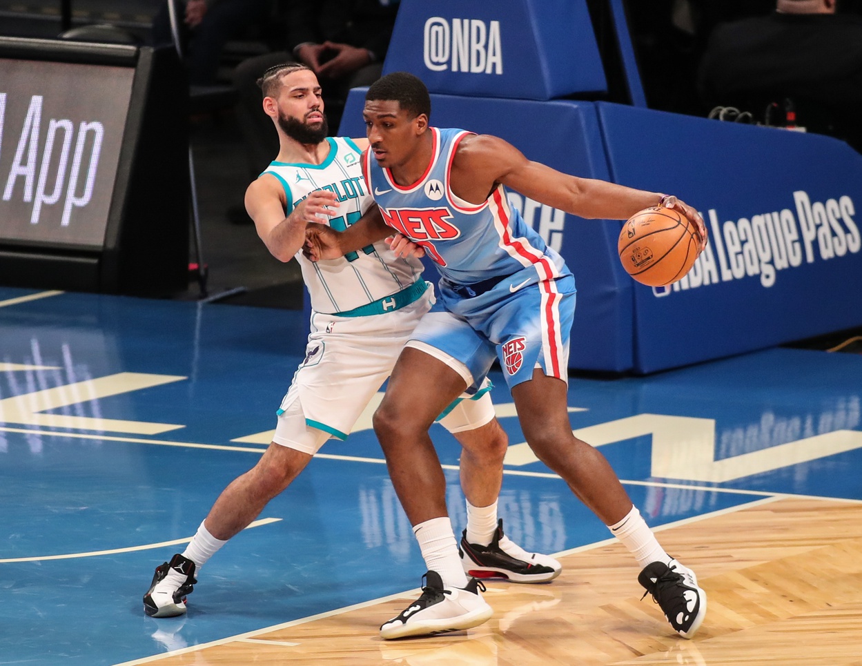 Apr 1, 2021; Brooklyn, New York, USA; Brooklyn Nets forward Reggie Perry (0) and Charlotte Hornets forward Cody Martin (11) at Barclays Center
