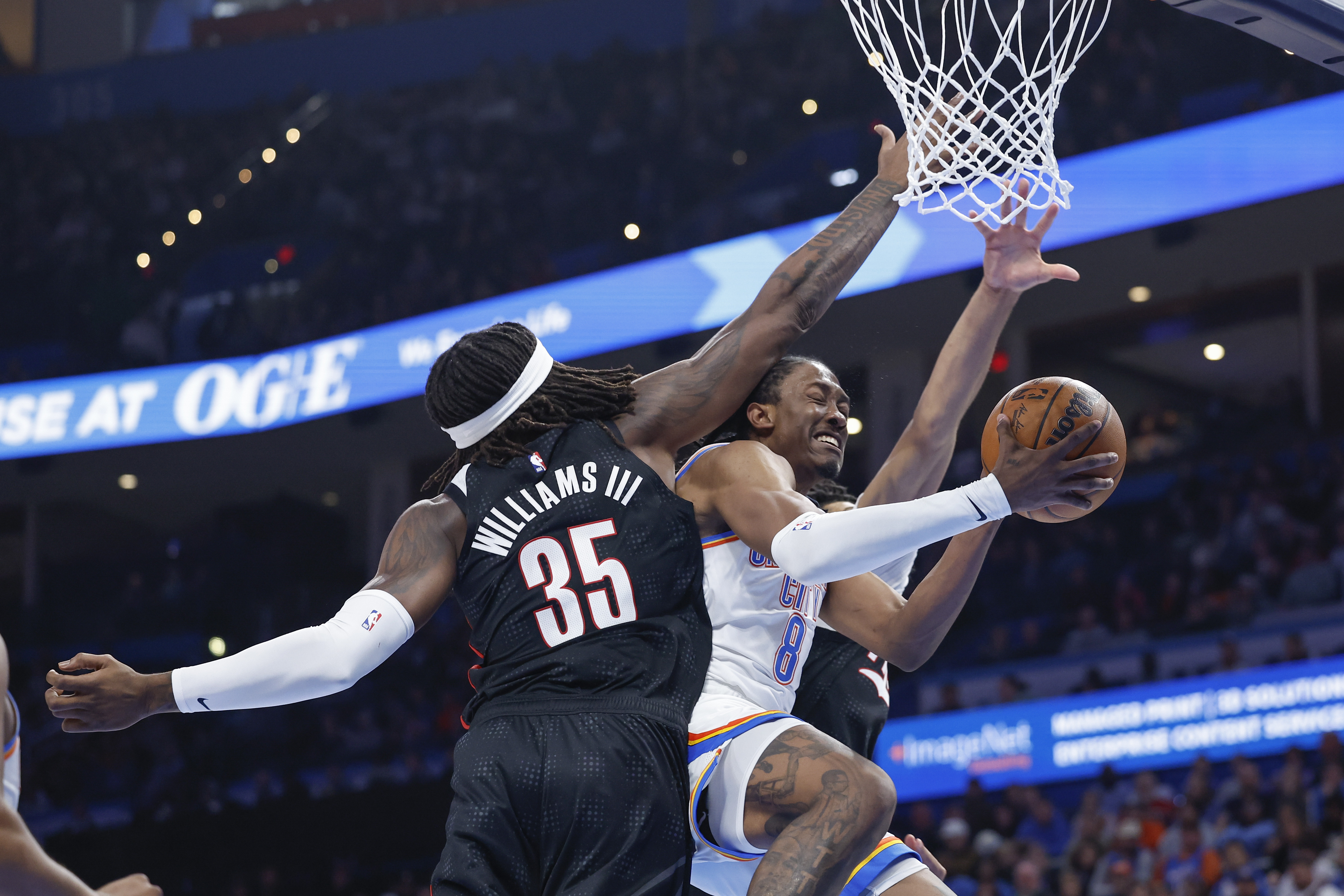 Nov 20, 2024; Oklahoma City, Oklahoma, USA; Oklahoma City Thunder forward Jalen Williams (8) drives to the basket against Portland Trail Blazers center Robert Williams III (35) during the second half at Paycom Center. Mandatory Credit: Alonzo Adams-Imagn Images  