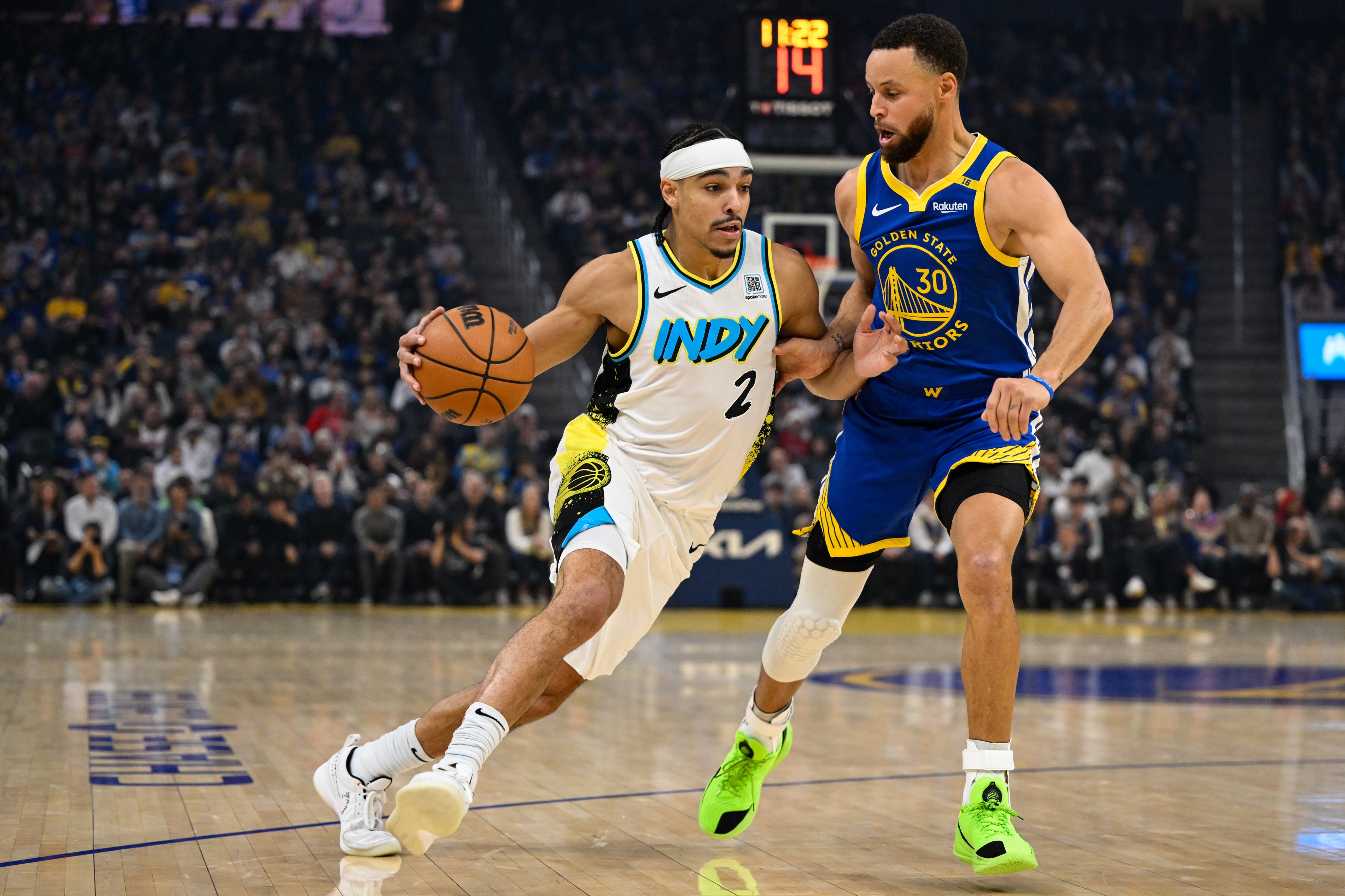 Indiana Pacers guard Andrew Nembhard (2) drives to the basket against Golden State Warriors guard Stephen Curry (30) in the first quarter at Chase Center. Mandatory Credit: Eakin Howard-Imagn Images