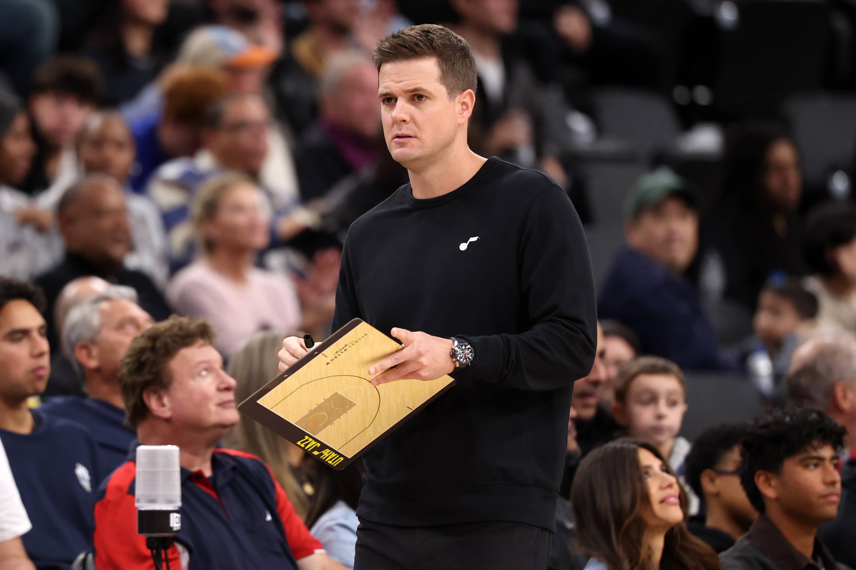 Nov 17, 2024; Inglewood, California, USA; Utah Jazz head coach Will Hardy holds a board during the fourth quarter against the Los Angeles Clippers at Intuit Dome. Mandatory Credit: Kiyoshi Mio-Imagn Images