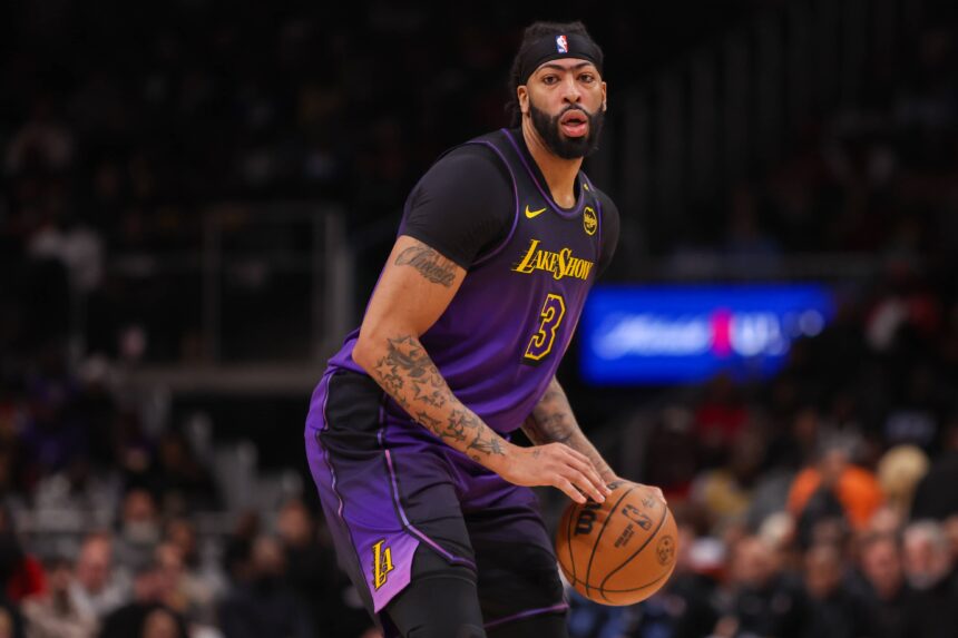 Dec 6, 2024; Atlanta, Georgia, USA; Los Angeles Lakers forward Anthony Davis (3) dribbles against the Atlanta Hawks in the second quarter at State Farm Arena. Mandatory Credit: Brett Davis-Imagn Images