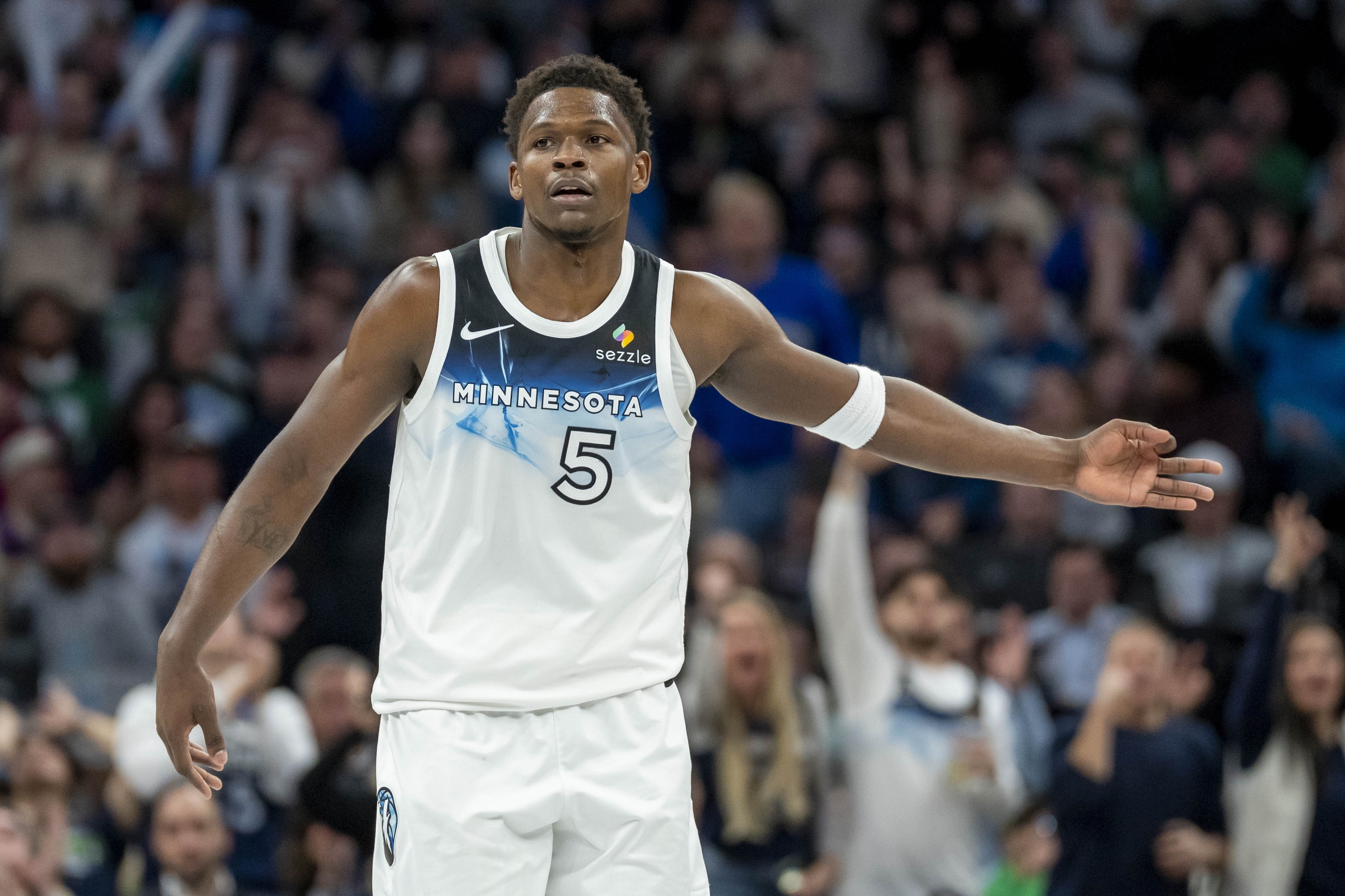 Minnesota Timberwolves guard Anthony Edwards (5) celebrates after making a three point shot against the Boston Celtics in the second half at Target Center. Mandatory Credit: Jesse Johnson-Imagn Images
