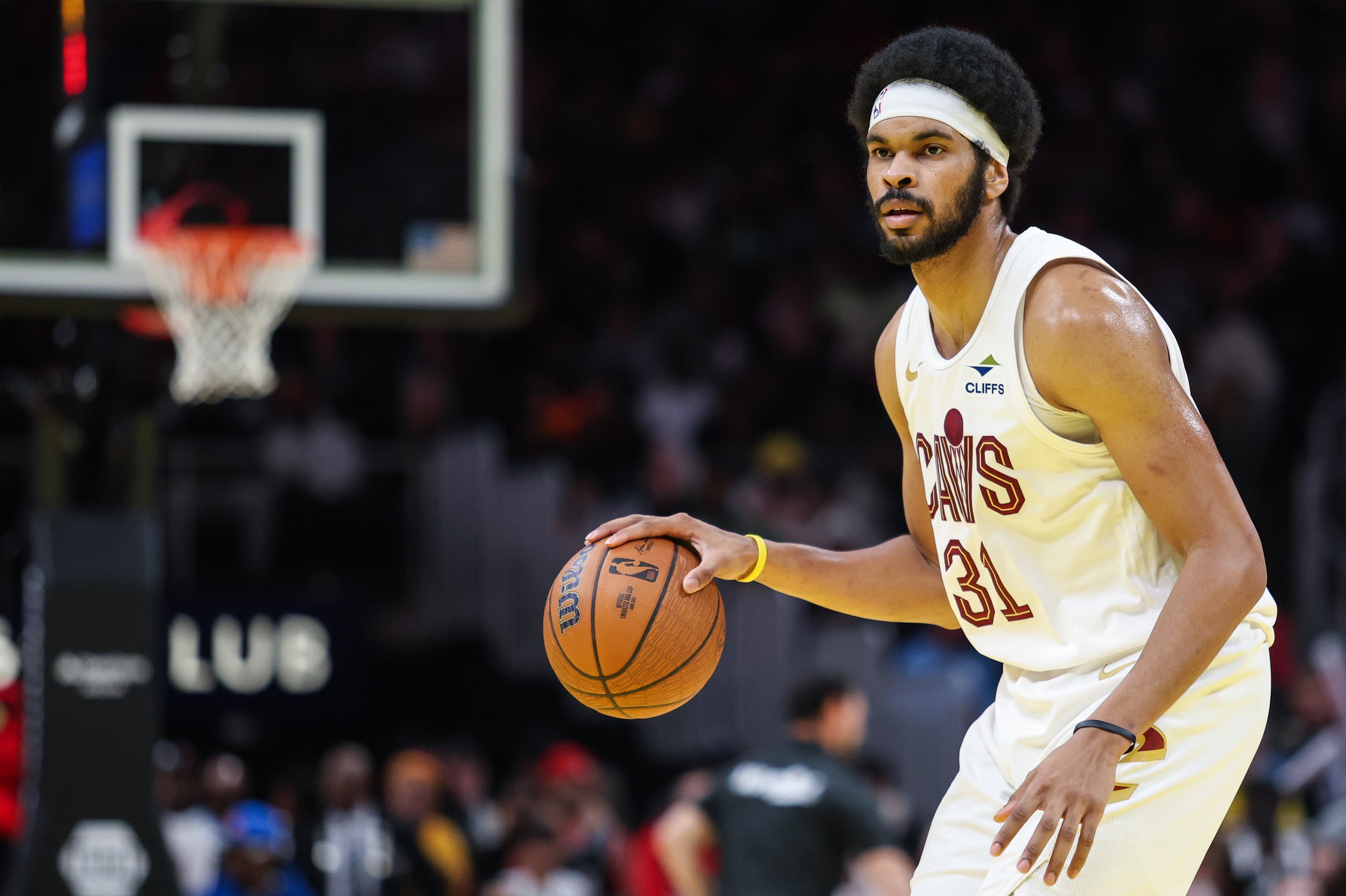 Cleveland Cavaliers center Jarrett Allen (31) dribbles the ball in the game against the Atlanta Hawks during the fourth quarter at State Farm Arena. Mandatory Credit: Jordan Godfree-Imagn Images