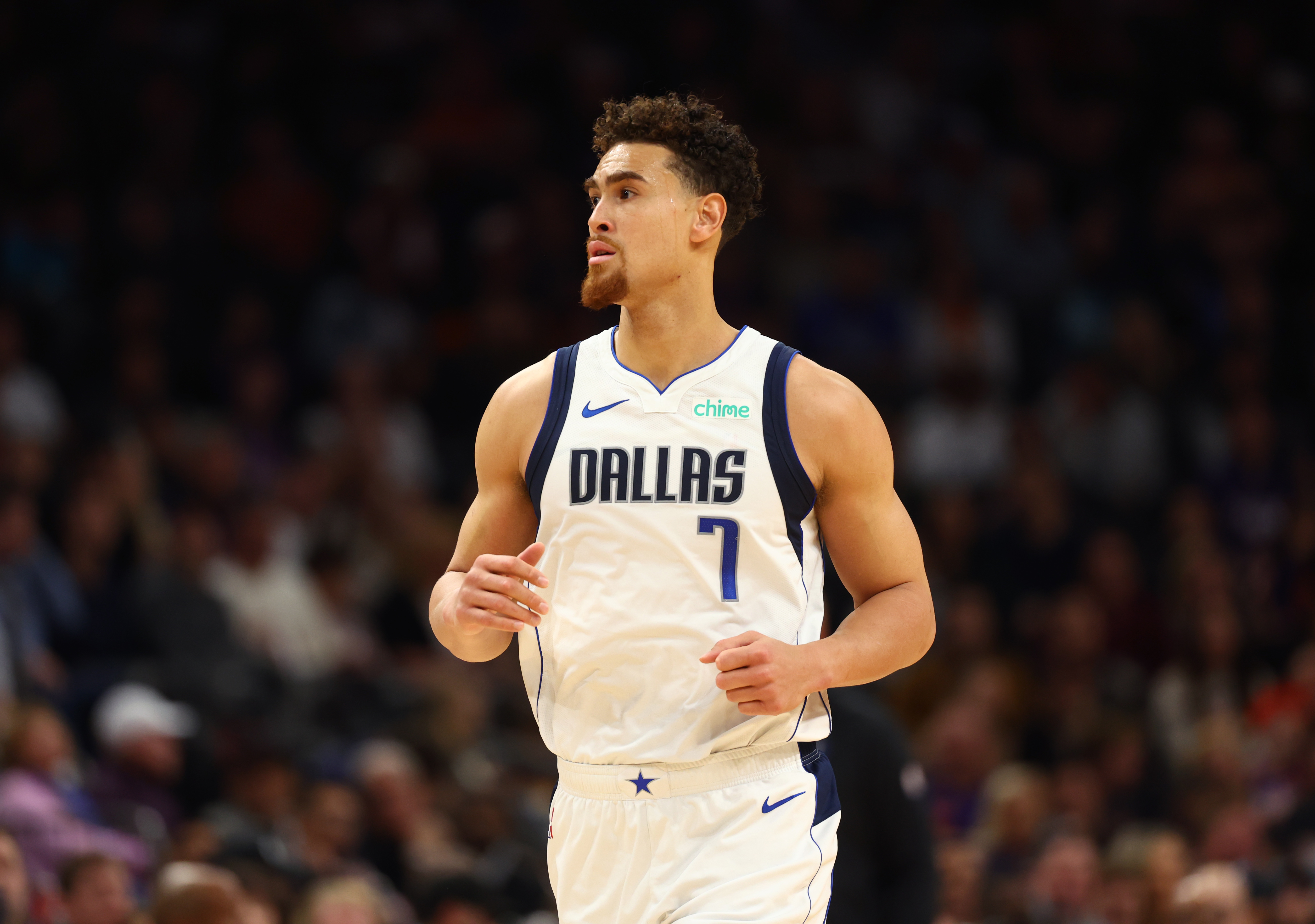 Dec 27, 2024; Phoenix, Arizona, USA; Dallas Mavericks center Dwight Powell (7) against the Phoenix Suns at Footprint Center. Mandatory Credit: Mark J. Rebilas-Imagn Images  