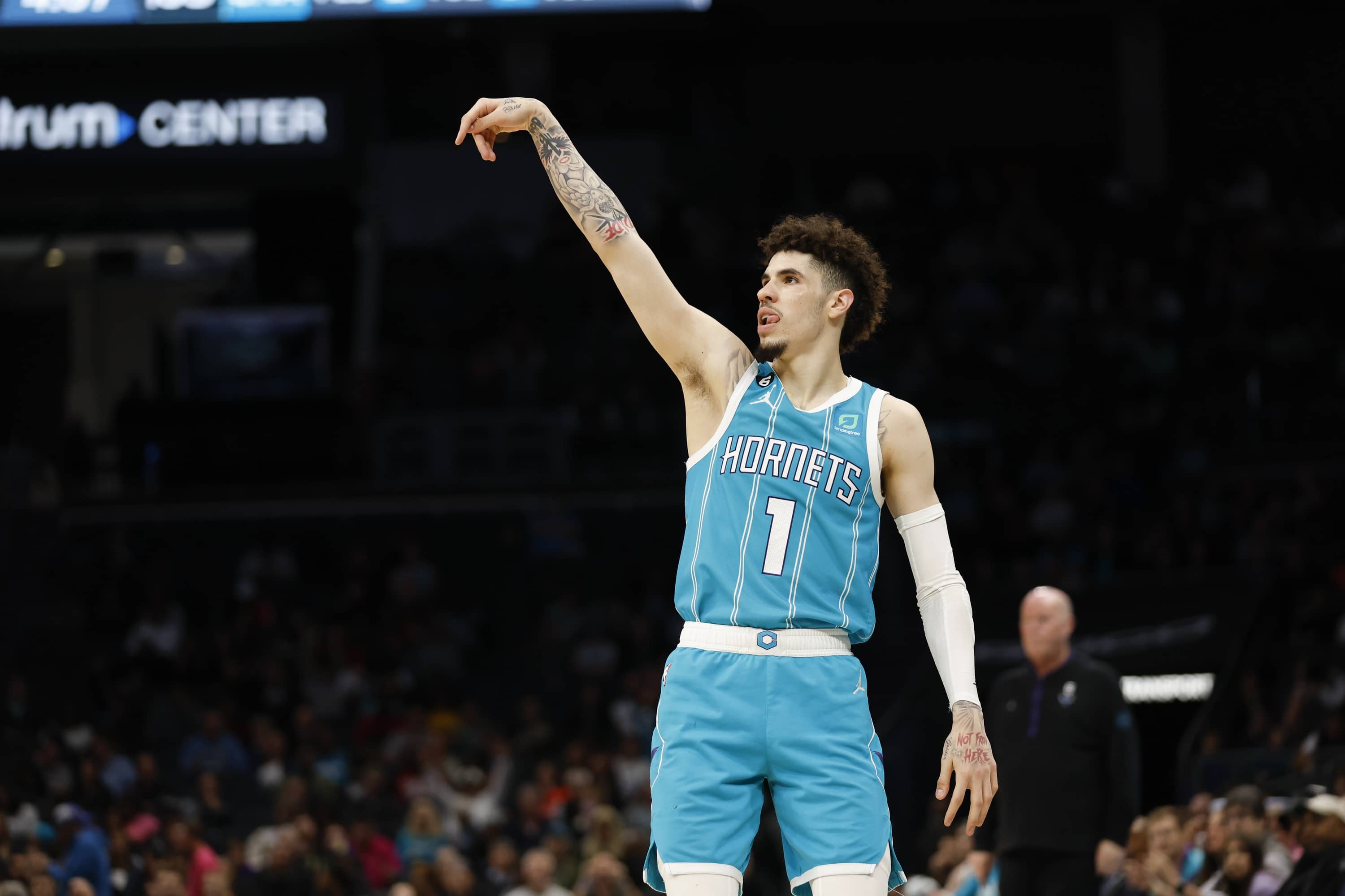 Feb 15, 2023; Charlotte, North Carolina, USA; Charlotte Hornets guard LaMelo Ball (1) watches his 3-point shot against the San Antonio Spurs during the second half at Spectrum Center. The Charlotte Hornets won 120-110. Mandatory Credit: Nell Redmond-Imagn Images