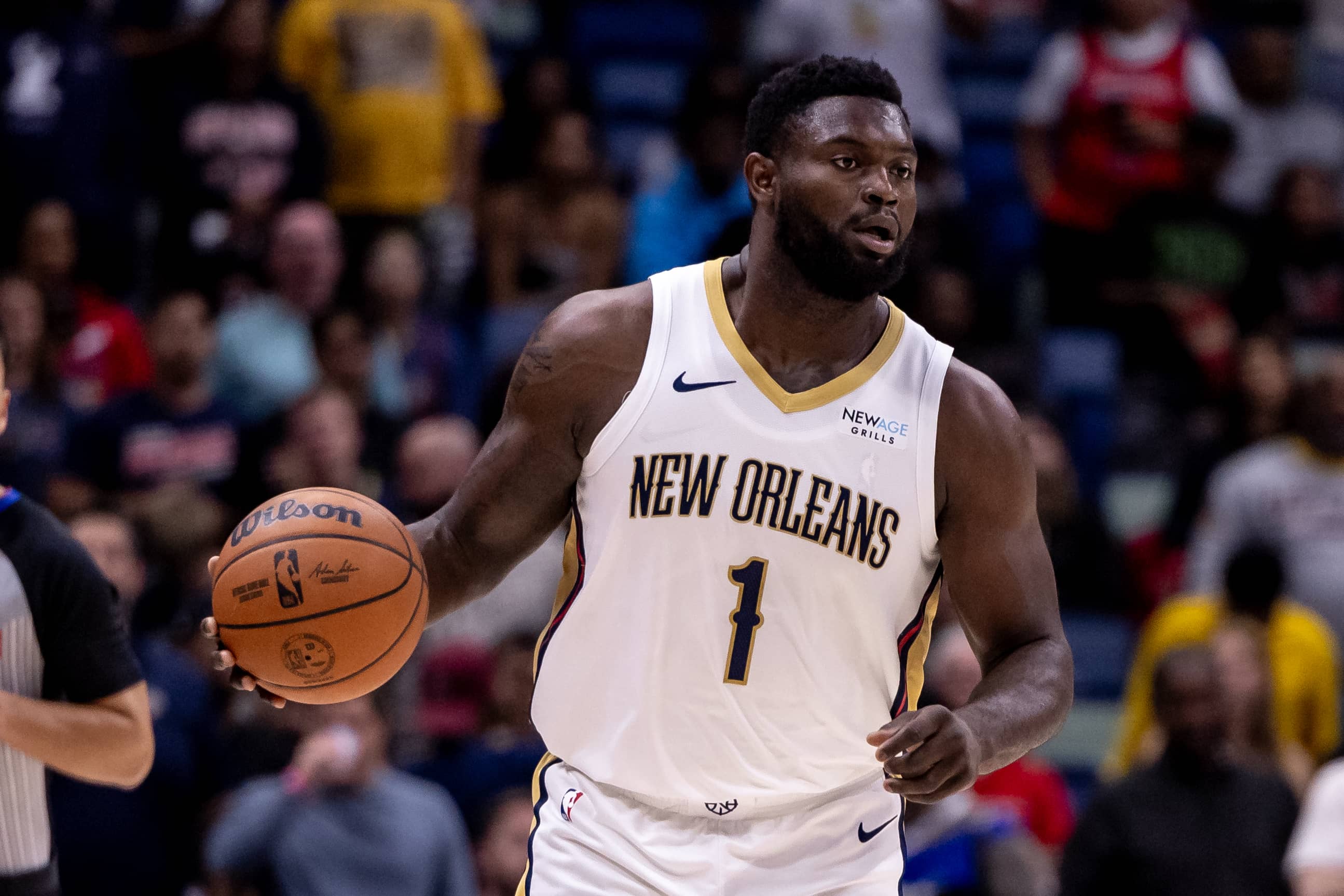 New Orleans, Louisiana, USA; New Orleans Pelicans forward Zion Williamson (1) brings the ball up court against the Indiana Pacers during the first half at Smoothie King Center. Mandatory Credit: Stephen Lew-Imagn Images
