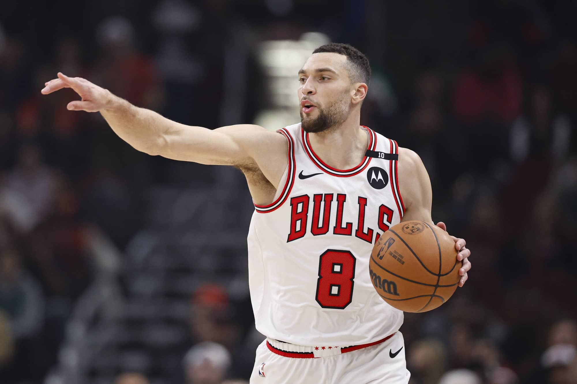 Jan 10, 2025; Chicago, Illinois, USA; Chicago Bulls guard Zach LaVine (8) brings the ball up court against the Washington Wizards during the first half at United Center. Mandatory Credit: Kamil Krzaczynski-Imagn Images  