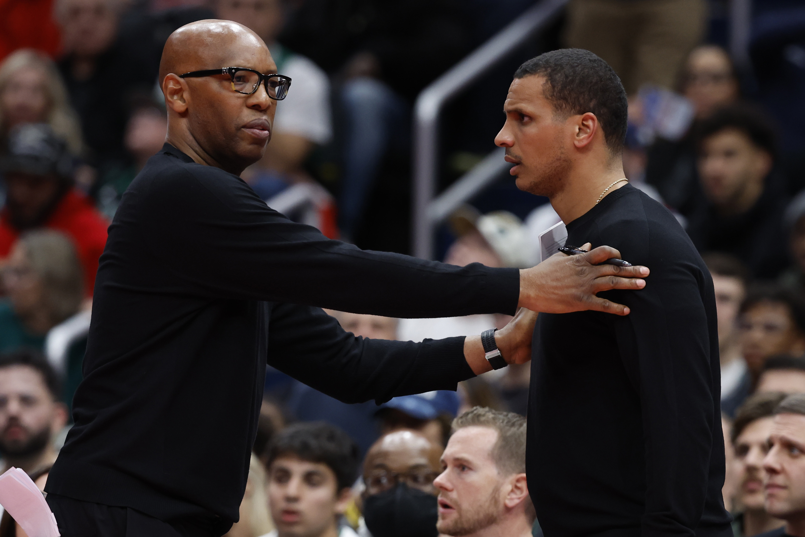 Nov 22, 2024; Washington, District of Columbia, USA; Boston Celtics head coach Joe Mazzulla is restrained by assistant coach Sam Cassell (L) after being assessed a technical foul against the Washington Wizards in the second half at Capital One Arena. Mandatory Credit: Geoff Burke-Imagn Images  
