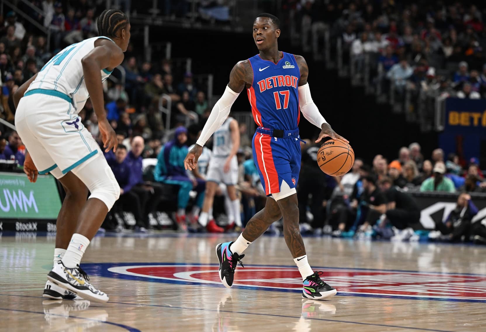 Detroit Pistons newly acquired guard, Dennis Schroder (17) dribbles the ball up the court in the second quarter at Little Caesars Arena.