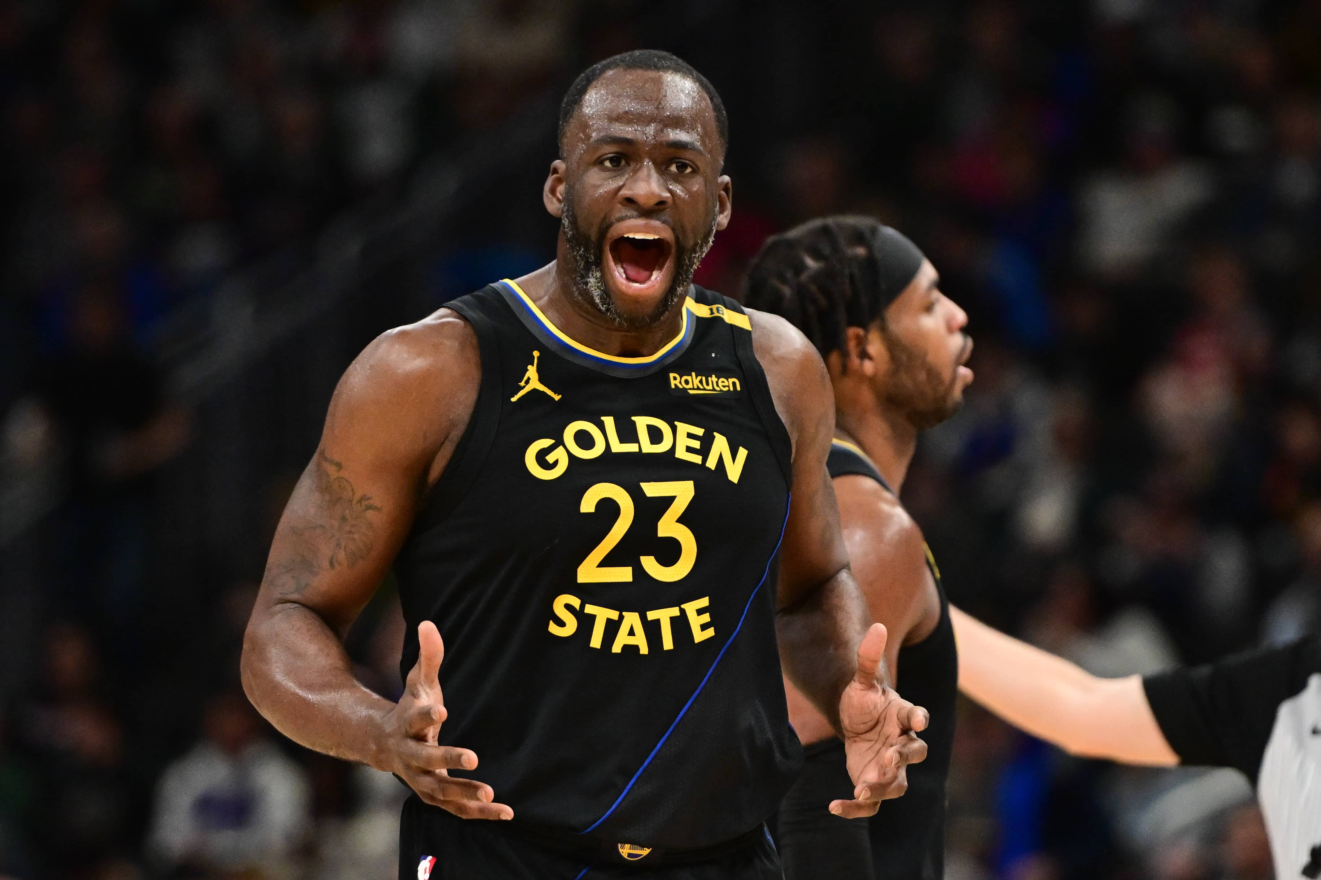 Milwaukee, Wisconsin, USA; Golden State Warriors forward Draymond Green (23) reacts after getting a technical foul against the Milwaukee Bucks in the third quarter at Fiserv Forum. Mandatory Credit: Benny Sieu-Imagn Images