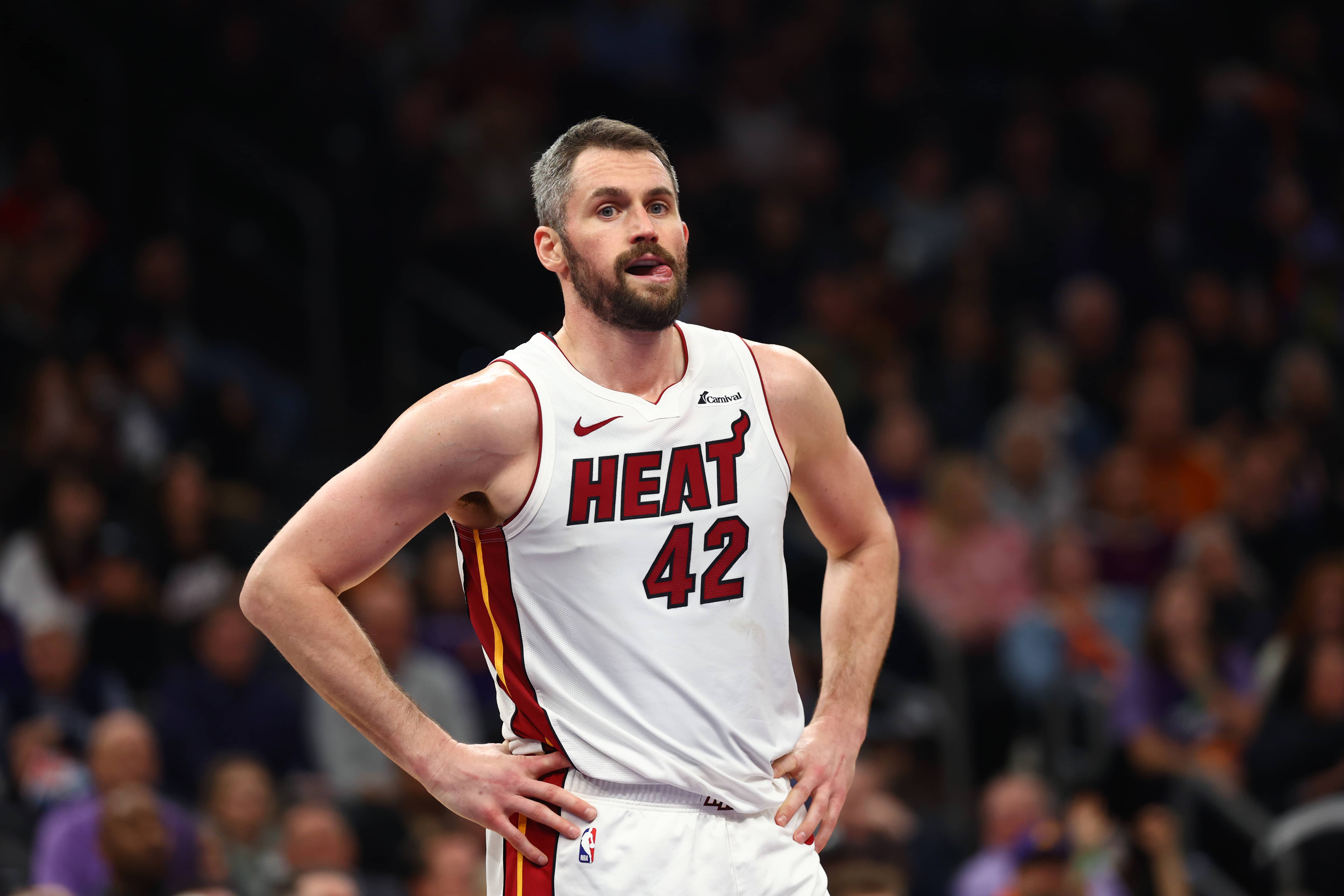 Phoenix, Arizona, USA; Miami Heat forward Kevin Love (42) against the Phoenix Suns at Footprint Center. Mandatory Credit: Mark J. Rebilas-USA TODAY Sports