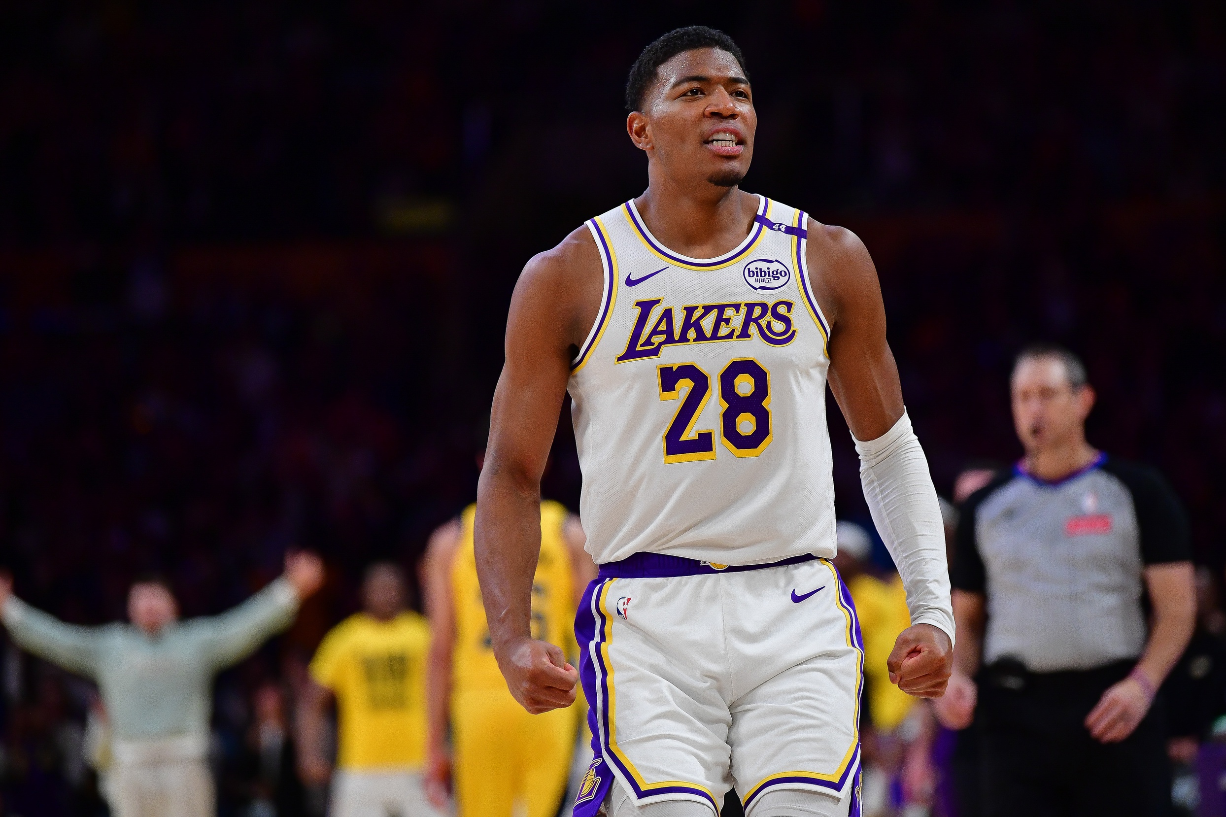 Los Angeles Lakers forward Rui Hachimura (28) reacts after dunking for the basket against the Indiana Pacers during the second half at Crypto.com Arena. Mandatory Credit: Gary A. Vasquez-Imagn Images