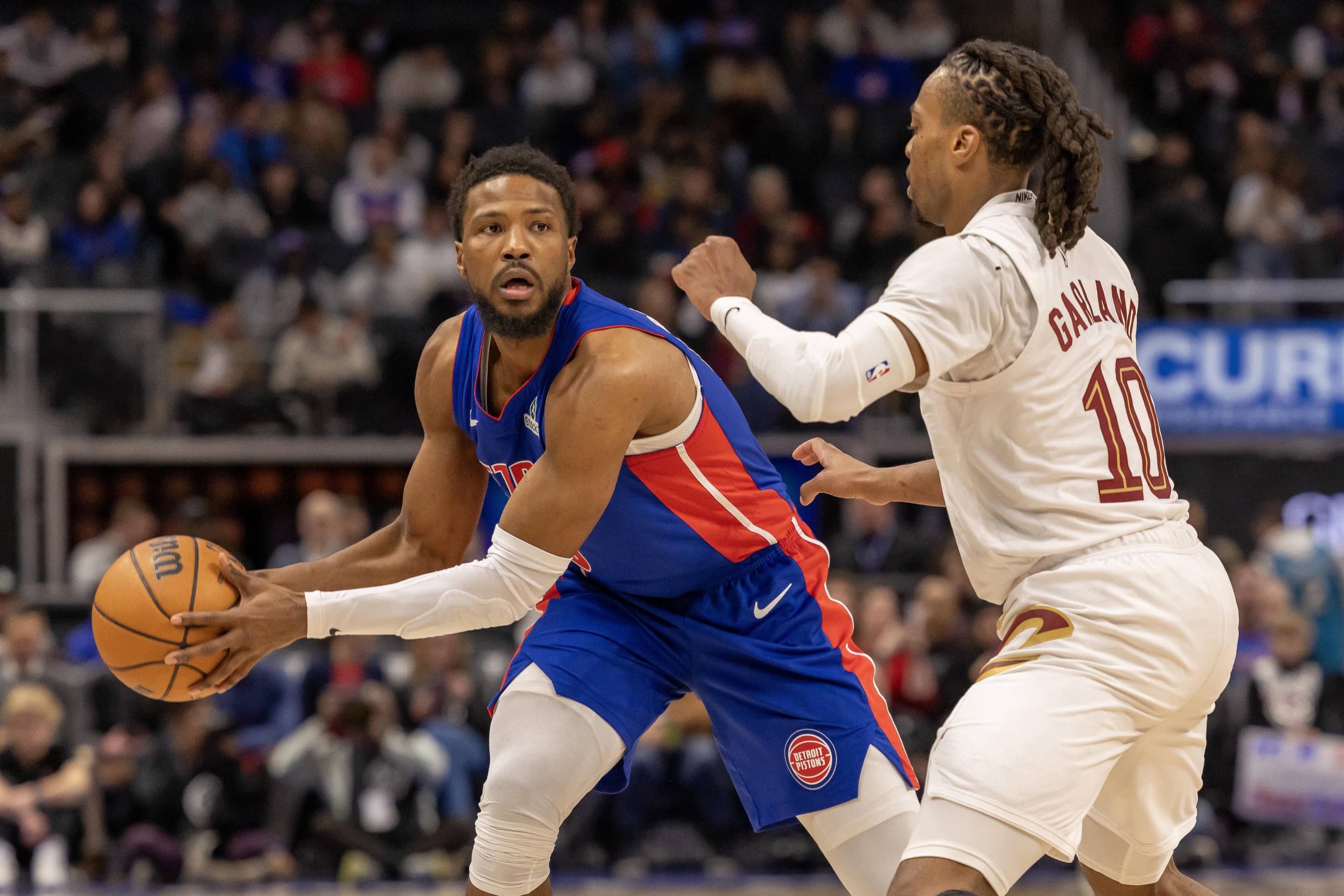 Cleveland Cavaliers guard Darius Garland (10) defends against Detroit Pistons guard Malik Beasley (5) during the first half at Little Caesars Arena.