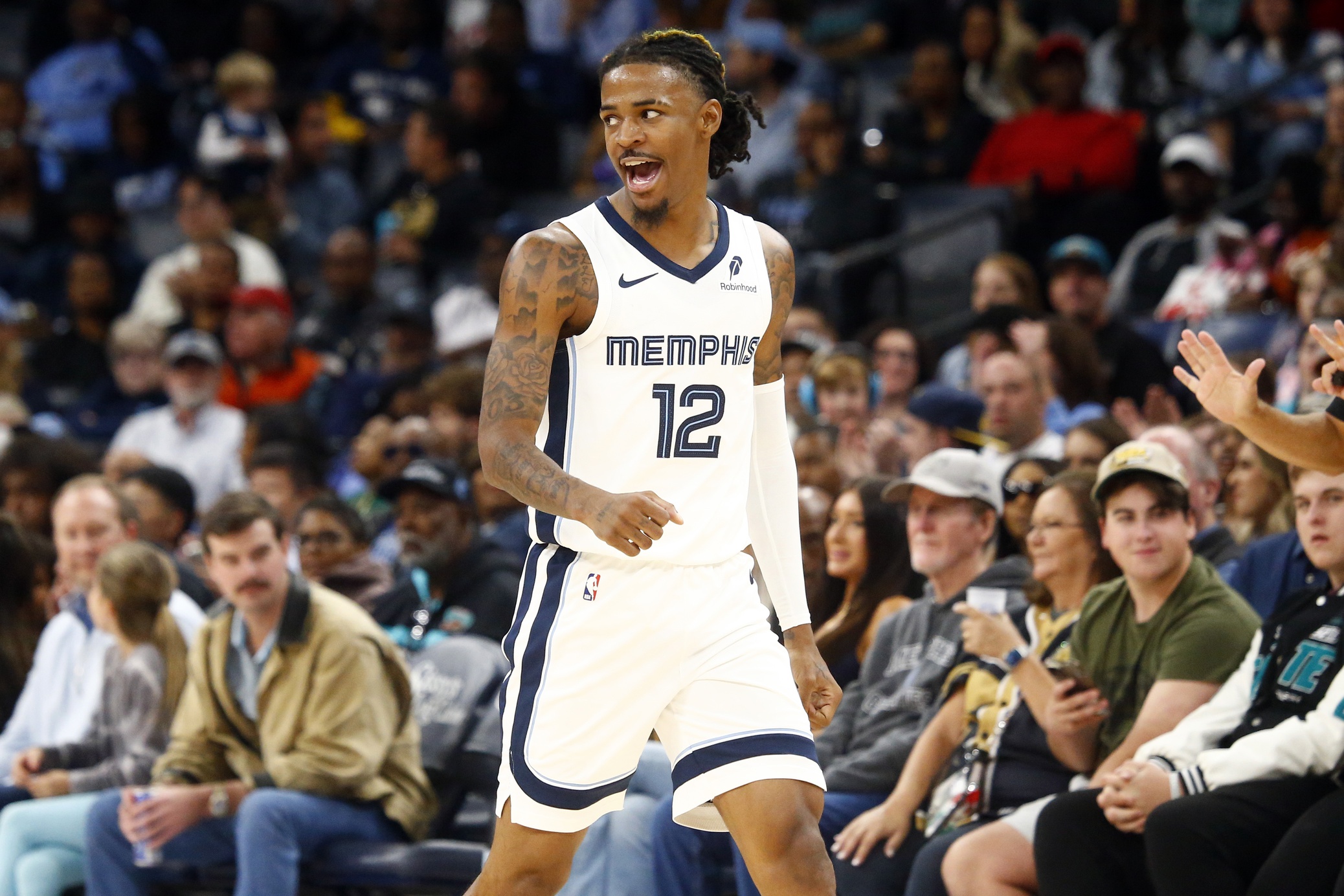 Memphis Grizzlies guard Ja Morant (12) reacts during the second half against the Miami Heat at FedExForum. Mandatory Credit: Petre Thomas-Imagn Images