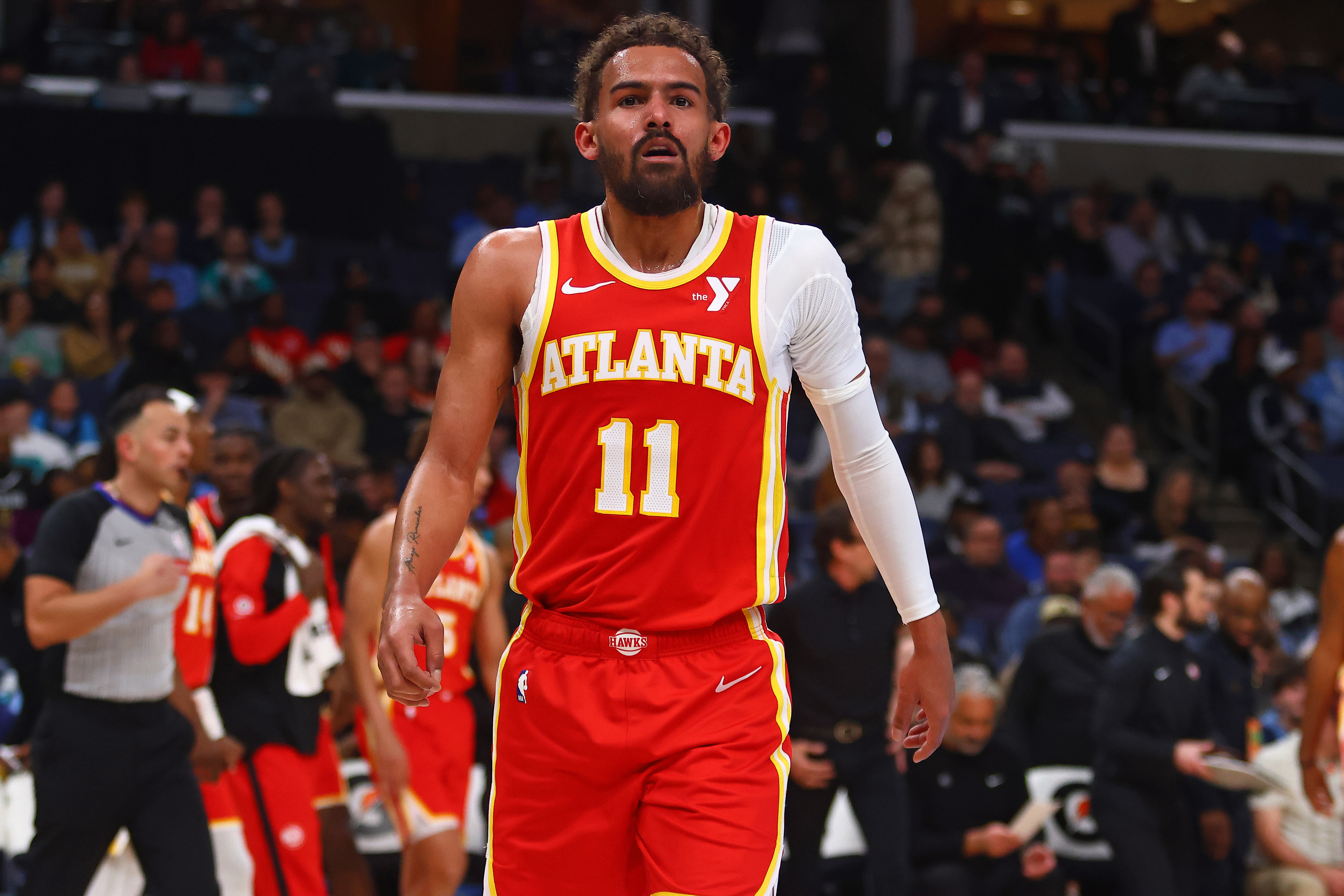 Mar 3, 2025; Memphis, Tennessee, USA; Atlanta Hawks guard Trae Young (11) walks off the court at halftime against the Memphis Grizzlies at FedExForum. Mandatory Credit: Petre Thomas-Imagn Images  