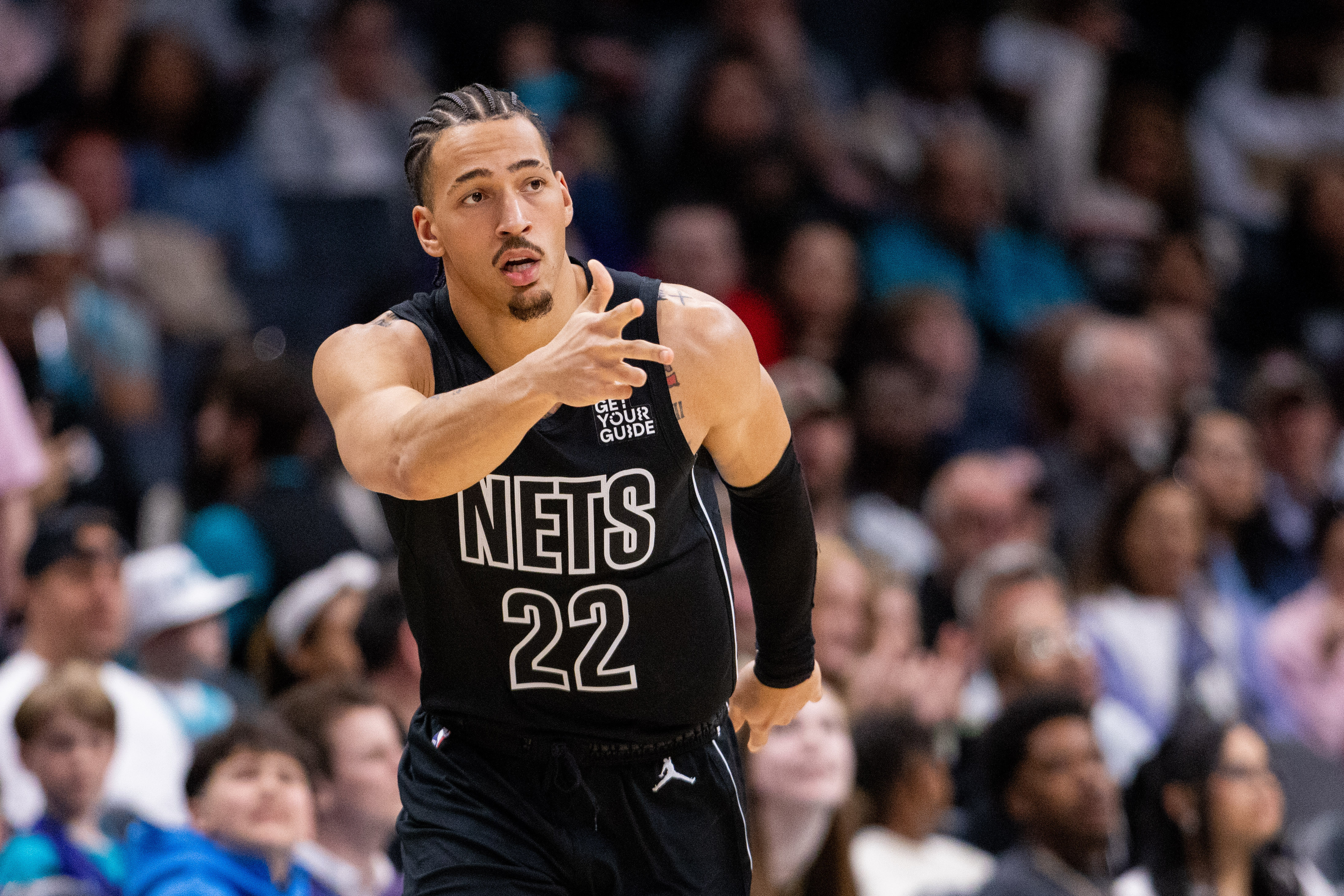 Mar 8, 2025; Charlotte, North Carolina, USA; Brooklyn Nets forward Jalen Wilson (22) celebrates a three point basket against the Charlotte Hornets during the third quarter at Spectrum Center. Mandatory Credit: Scott Kinser-Imagn Images  
