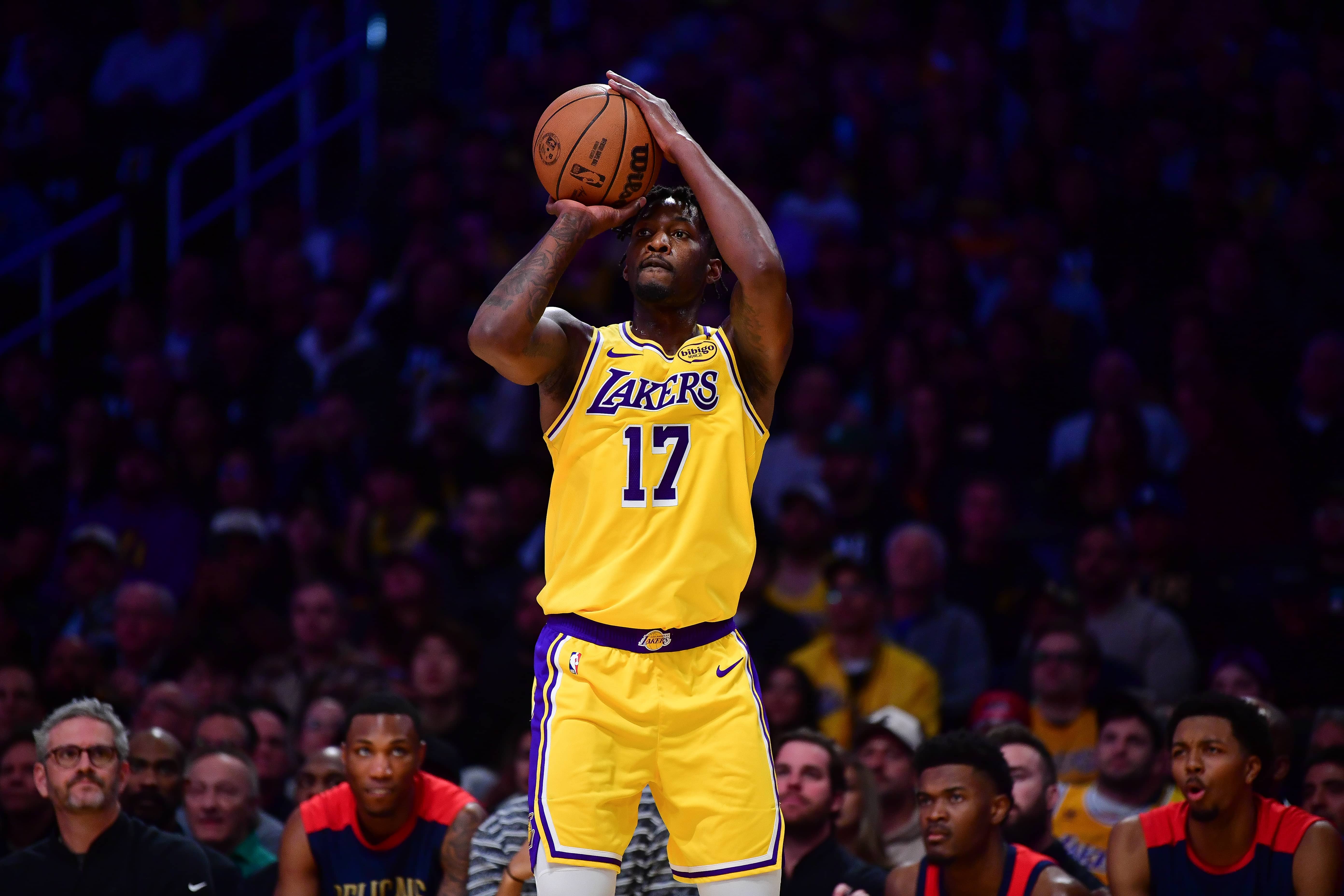 Los Angeles, California, USA; Los Angeles Lakers forward Dorian Finney-Smith (17) shoots against the New Orleans Pelicans during the first half at Crypto.com Arena. Mandatory Credit: Gary A. Vasquez-Imagn Images